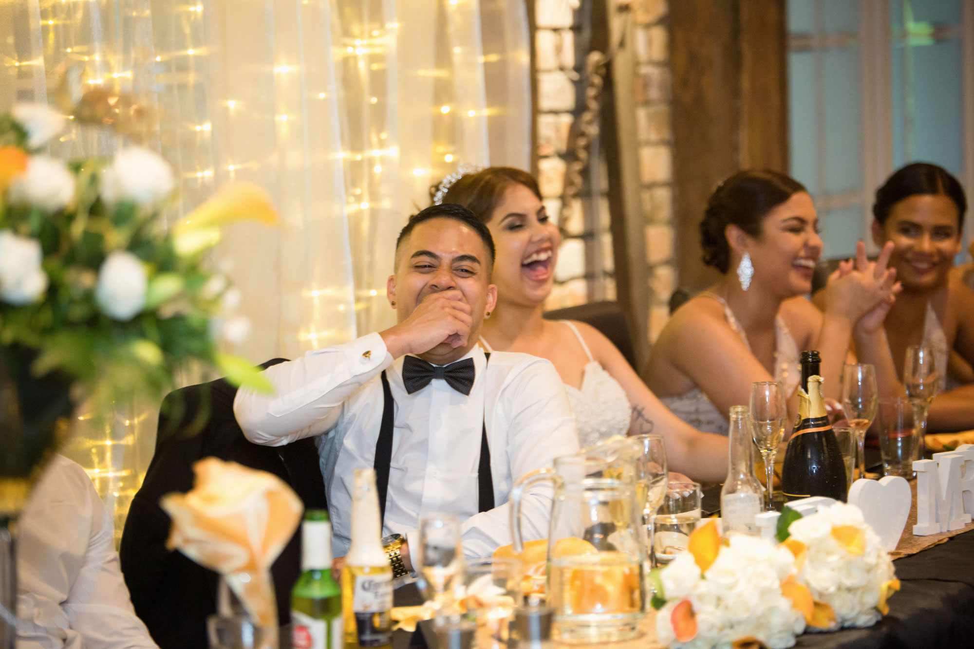 groom laughing at speech