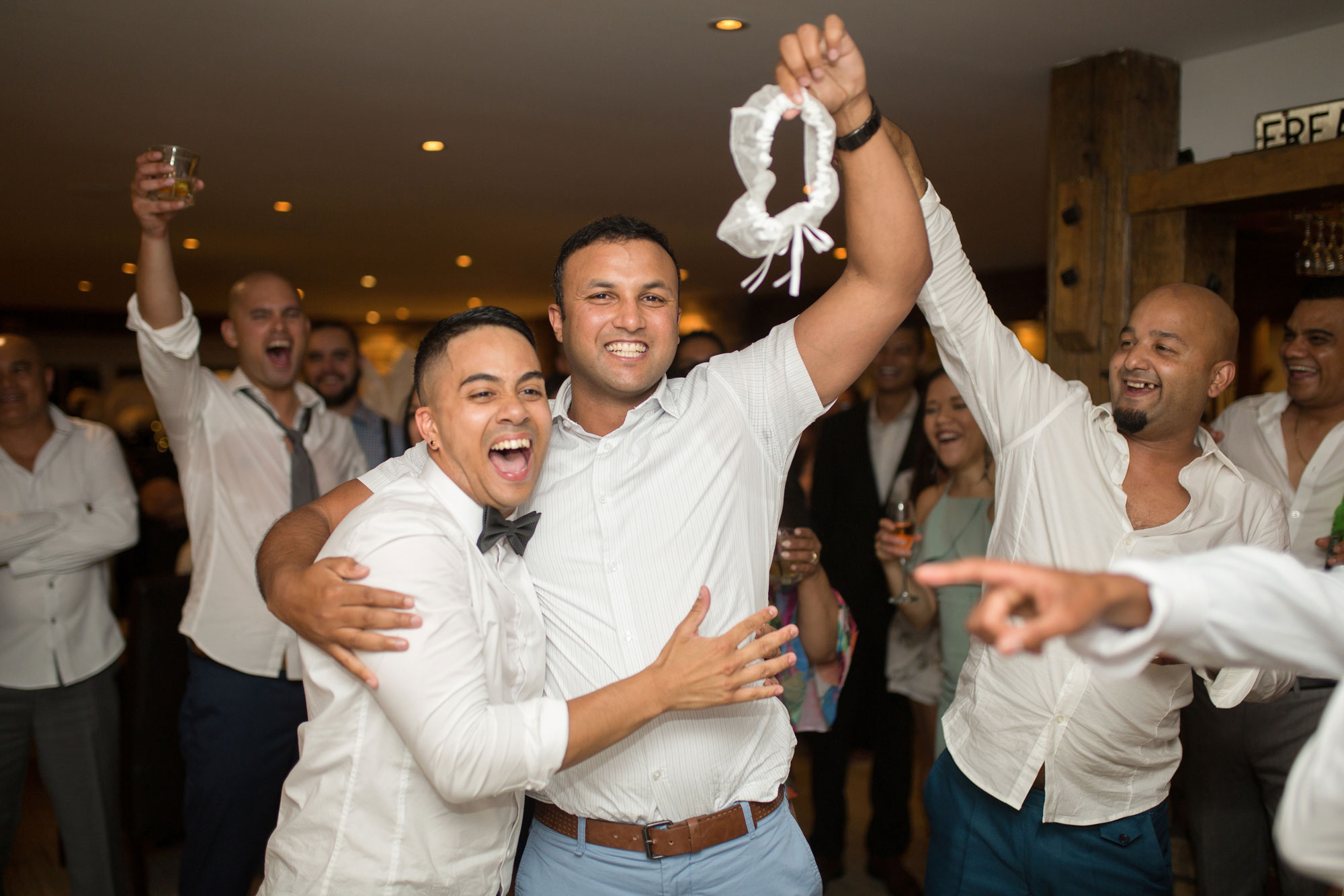 groom garter toss