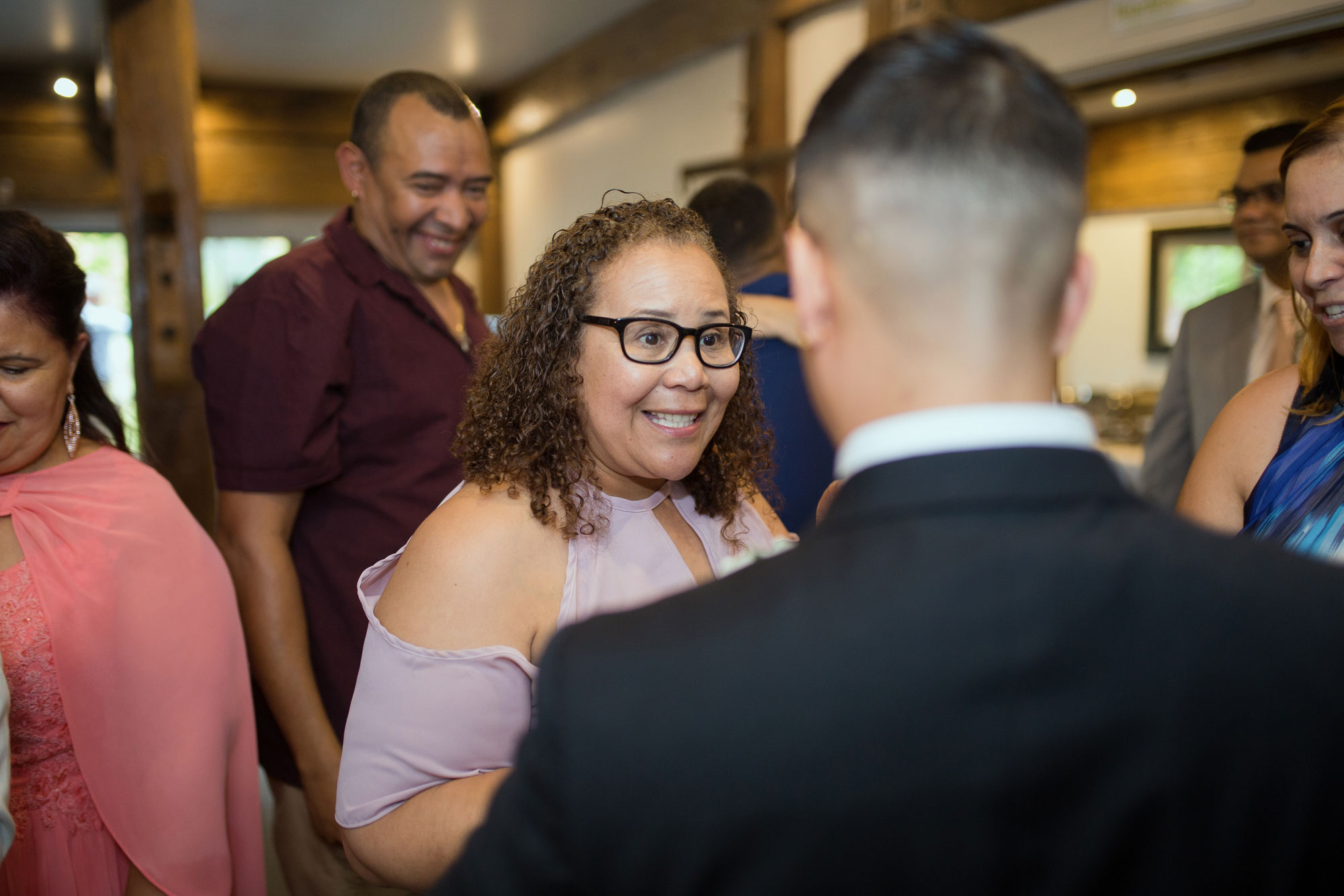 guest talking to the groom