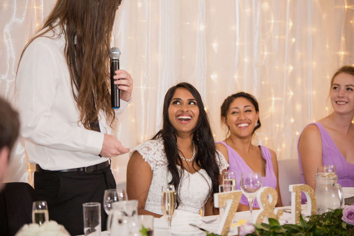 bride listening to groom speech