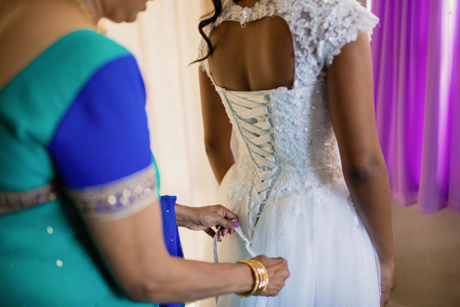 bridal dress tying