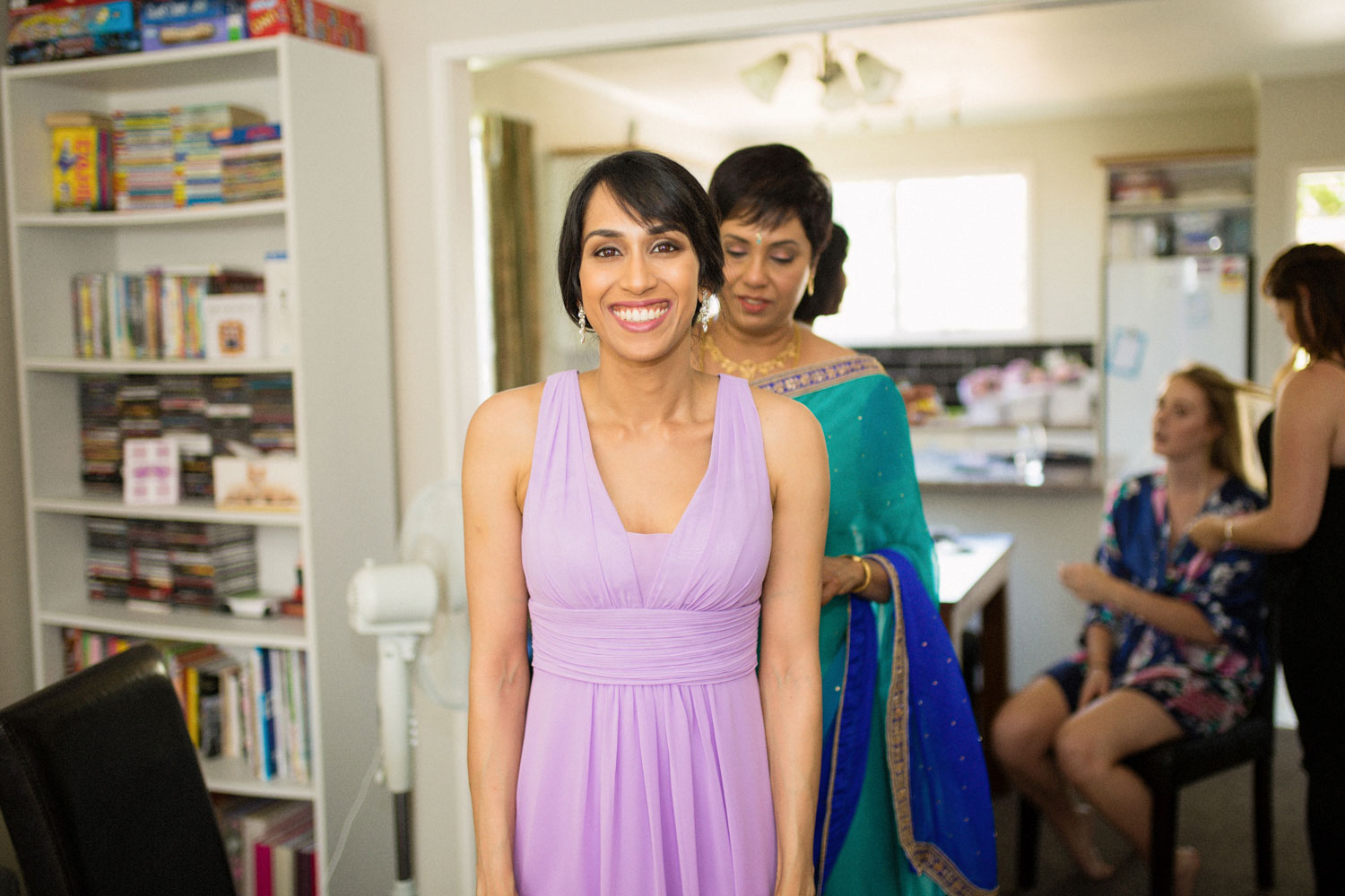 sister of the bride smiling