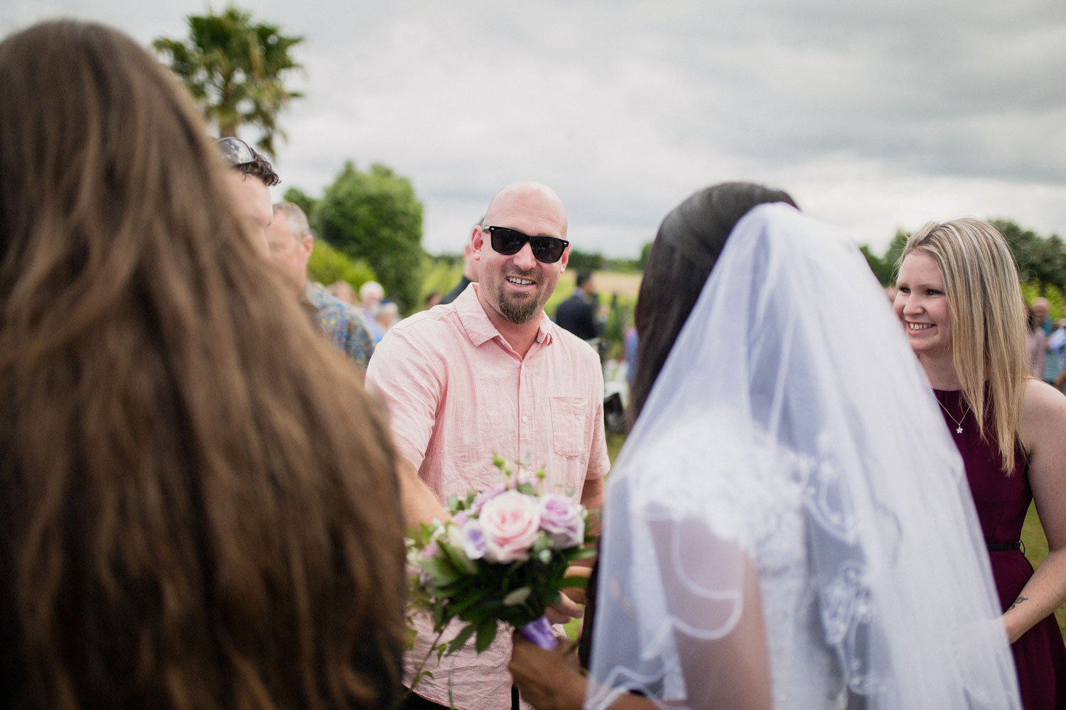 guests congratulating bride