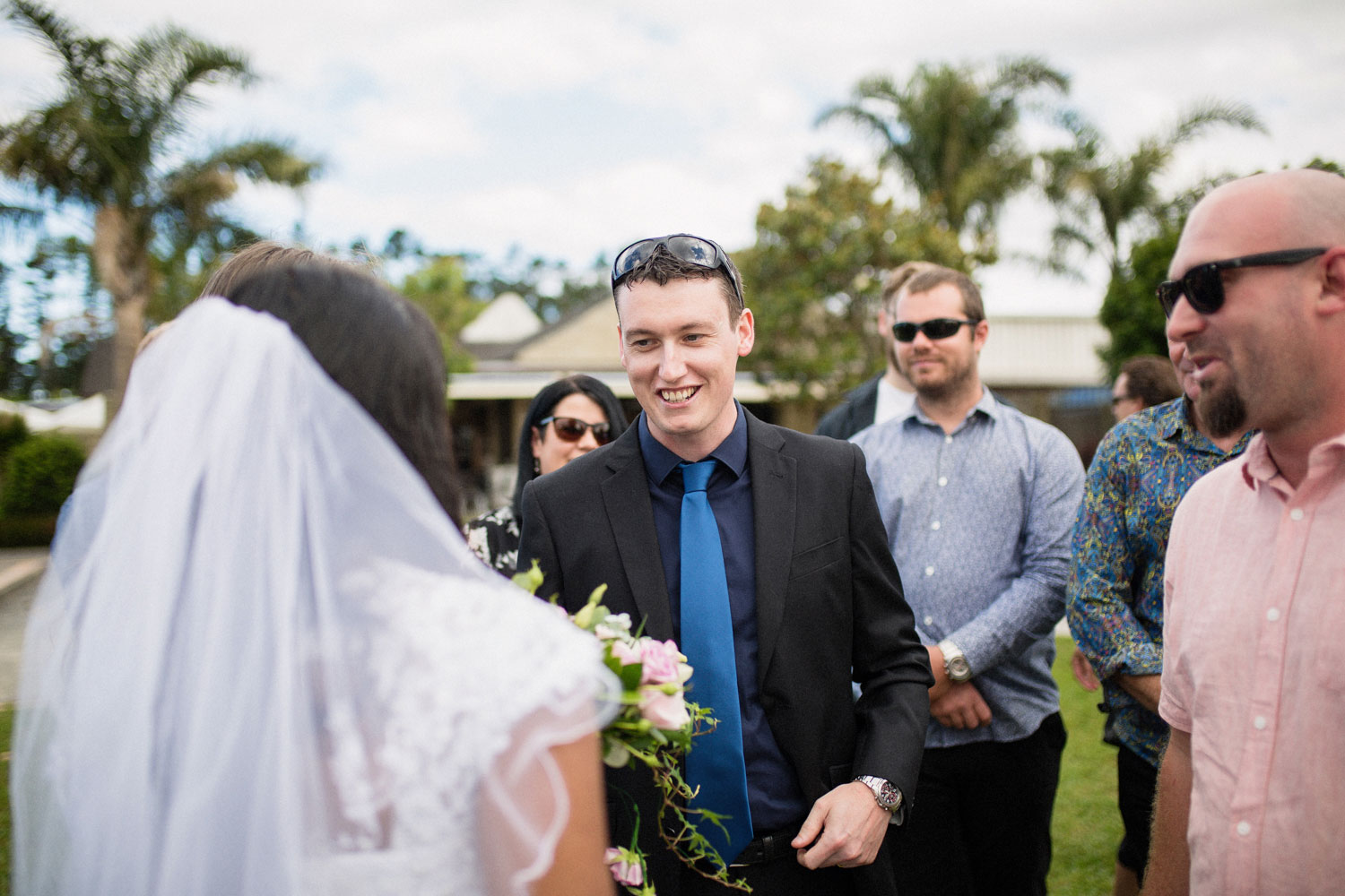 guests talking to bride