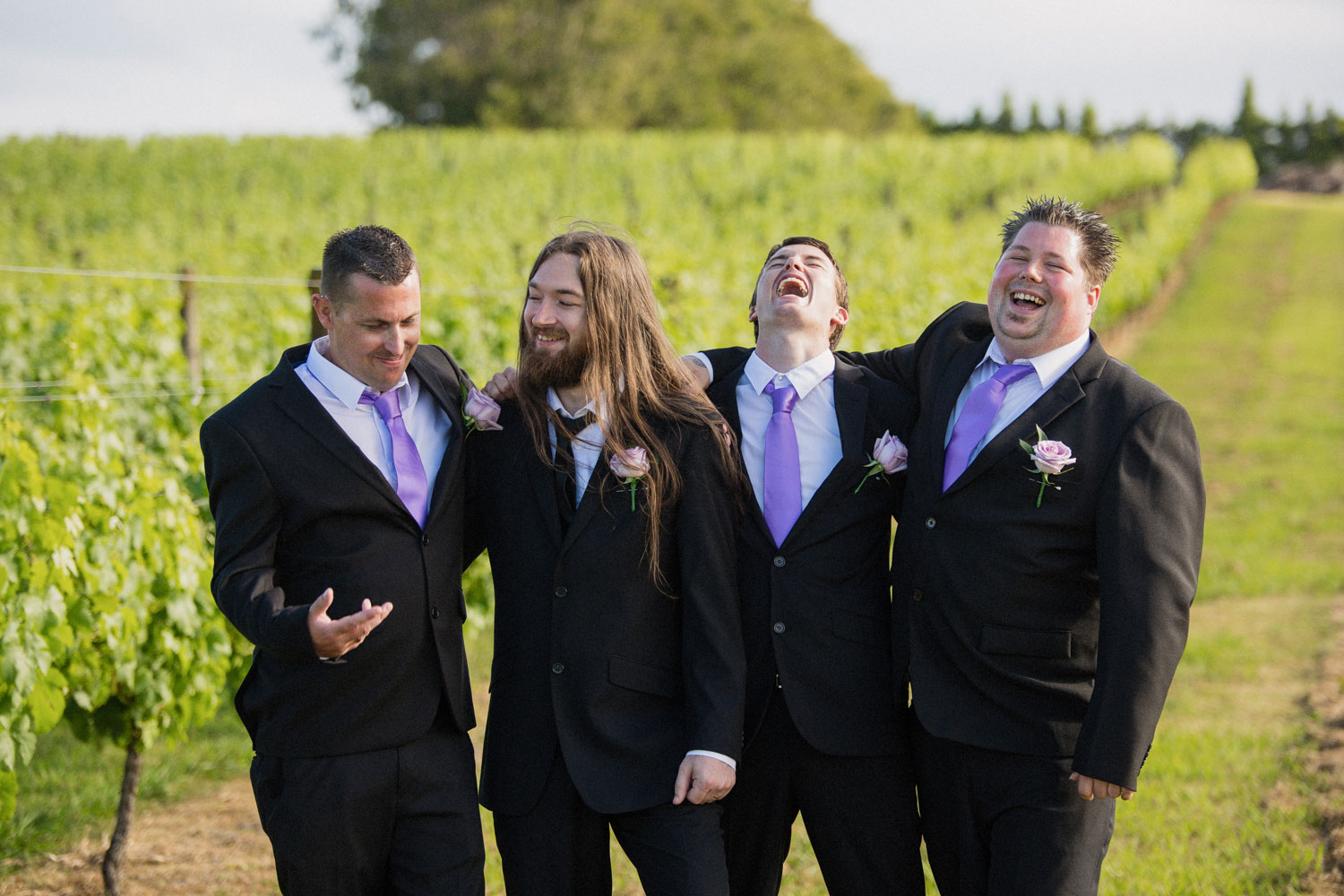 groom and the boys laughing