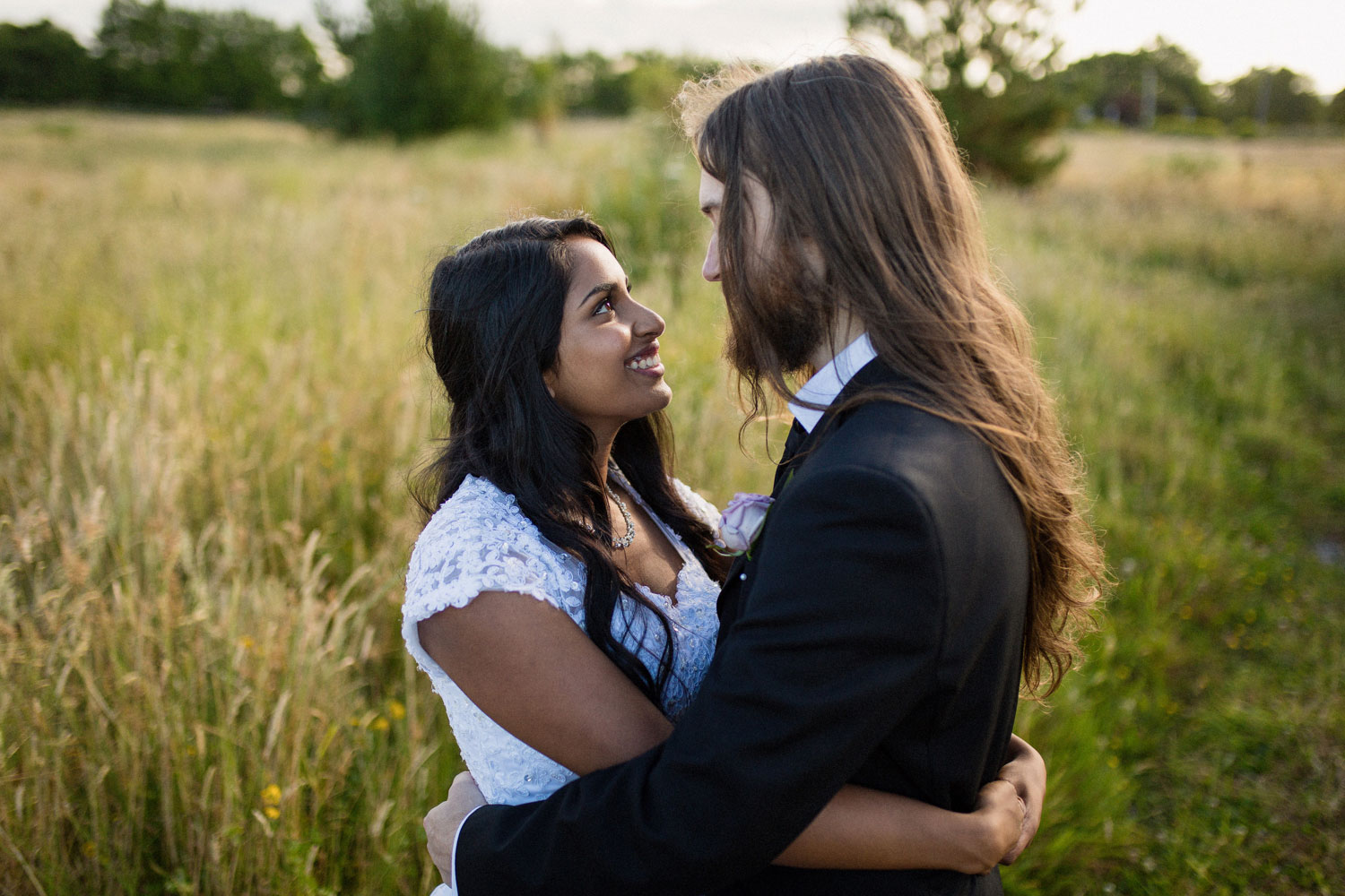 bride and groom looking at each other