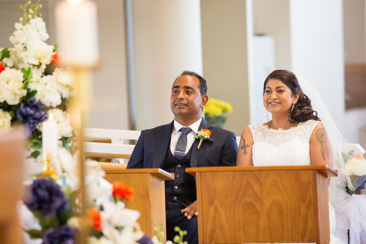 bride and groom smiling