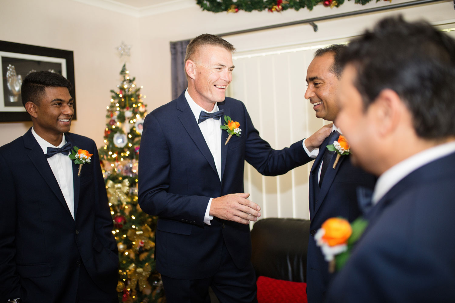 bestman talking to groom