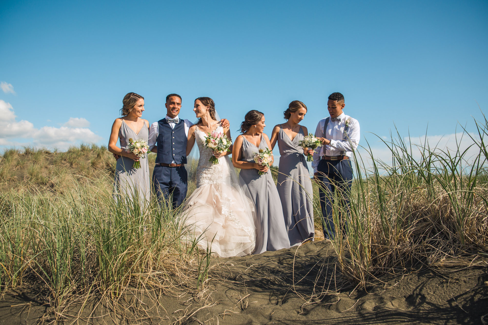 bridal party at bethells beach