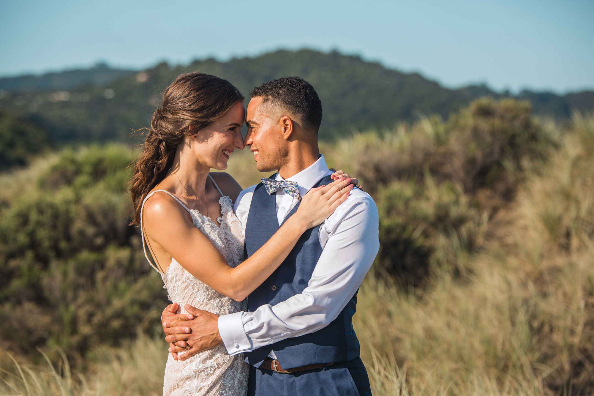 bride and groom embrace