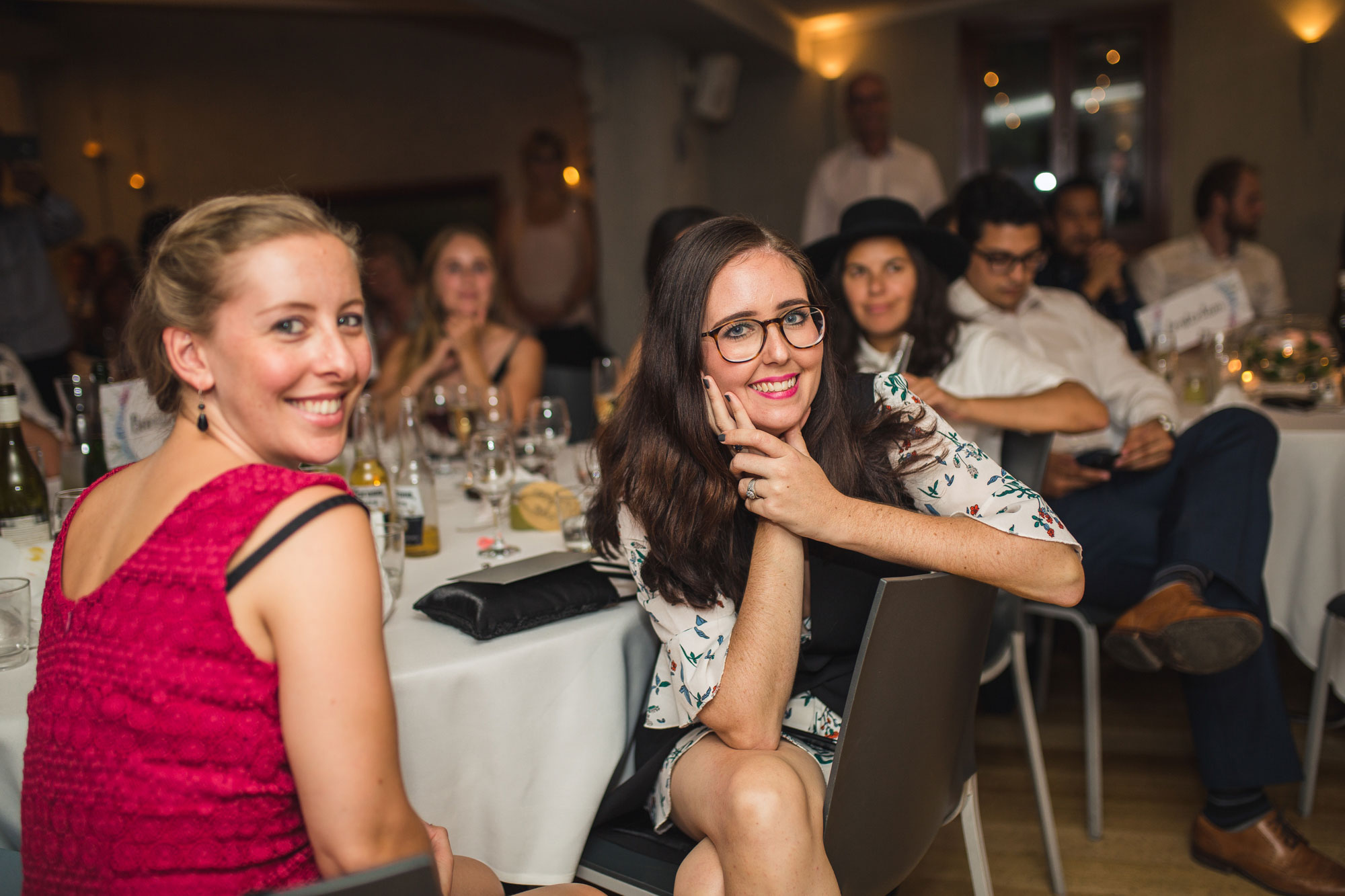 guest smiling at wedding reception