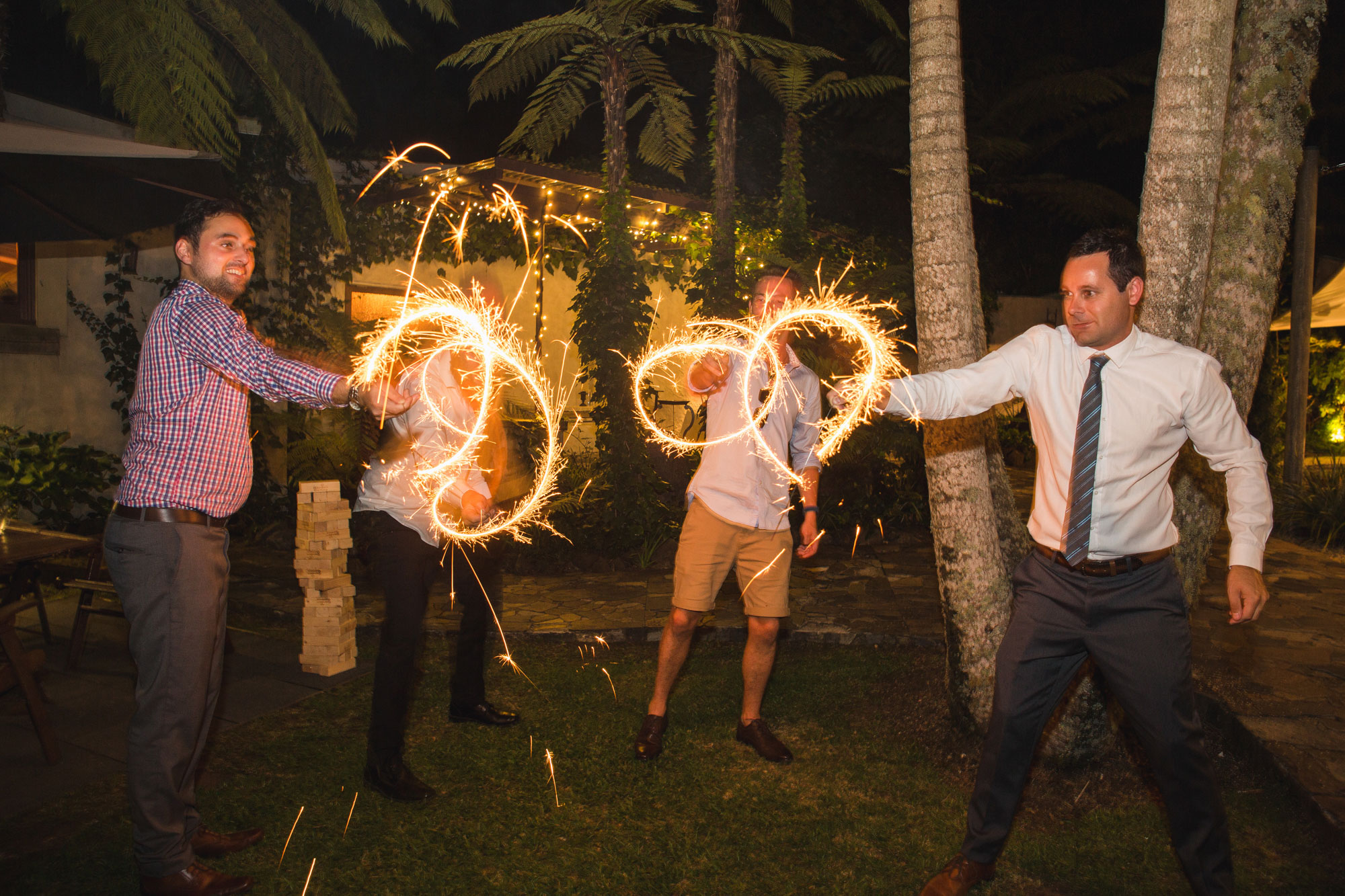 wedding guests playing with sparklers