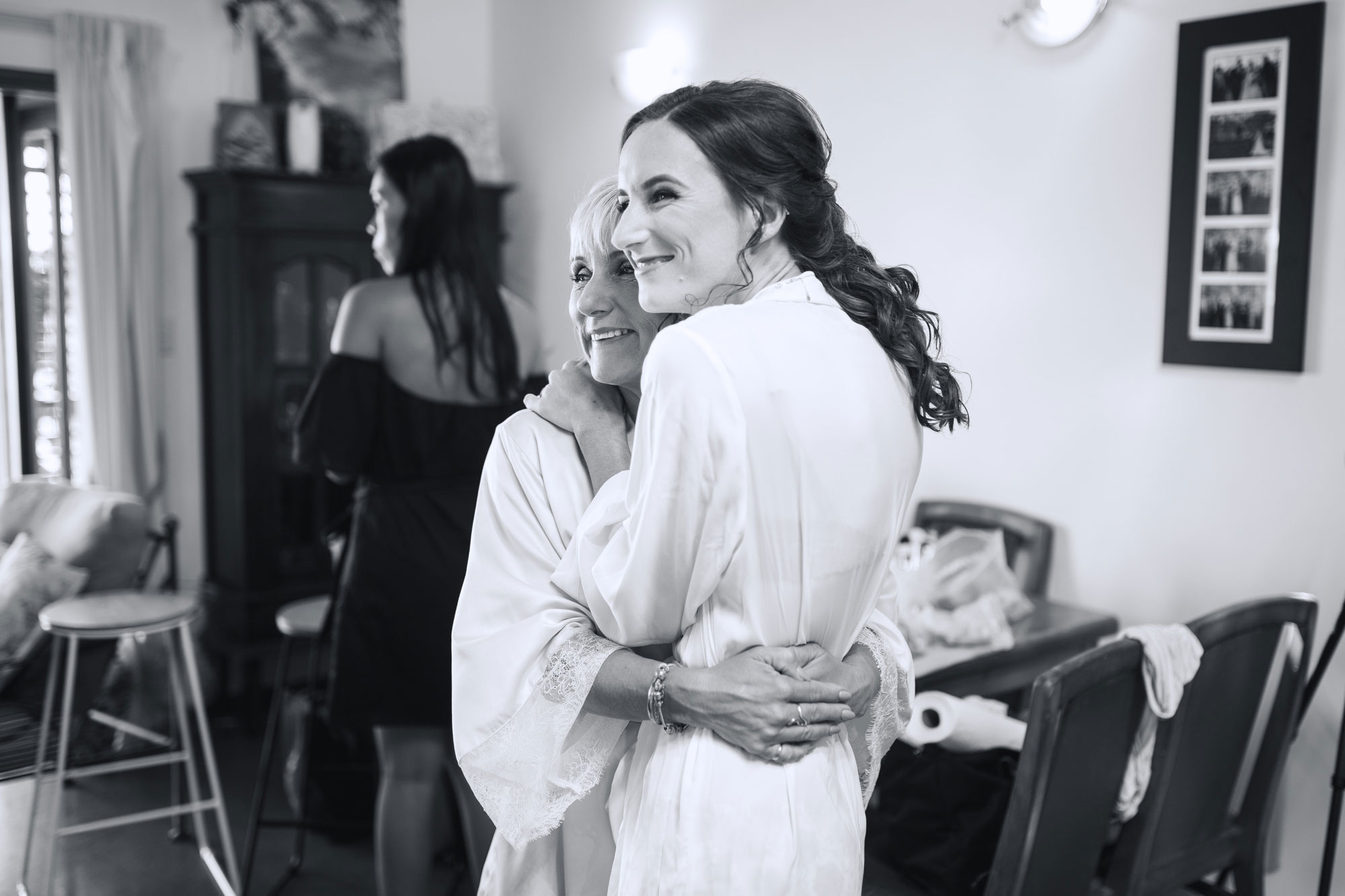 bride hugging her mother