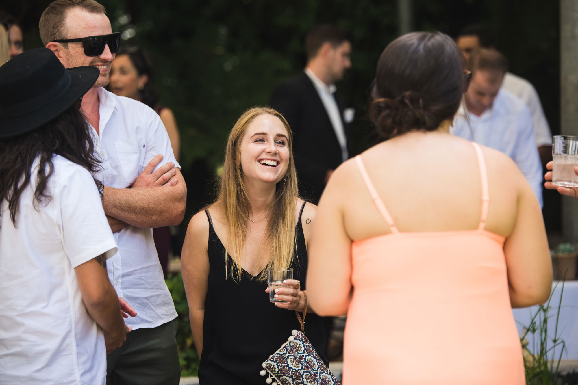 wedding guests laughing