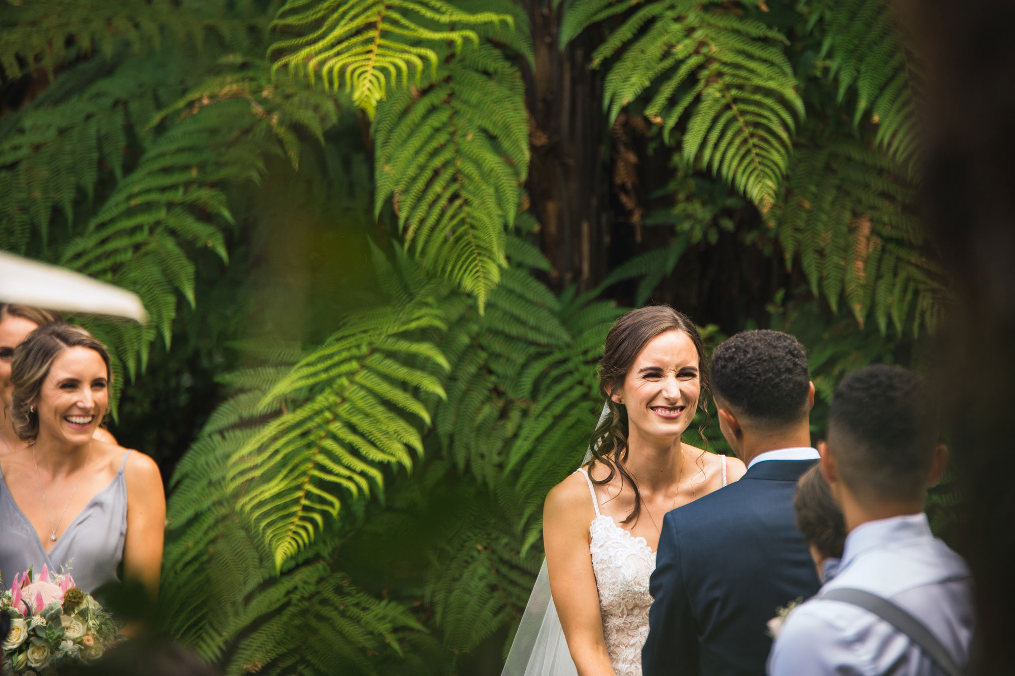 bride laughing at the ceremony