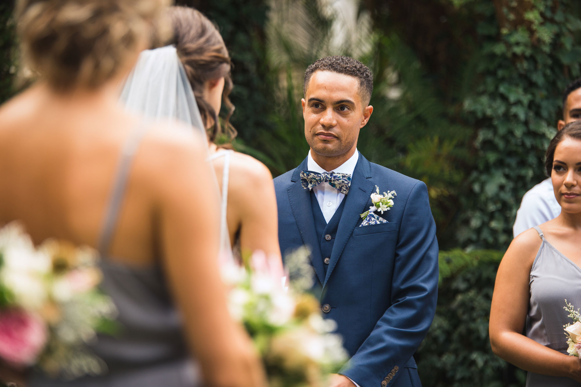 groom looking at bride