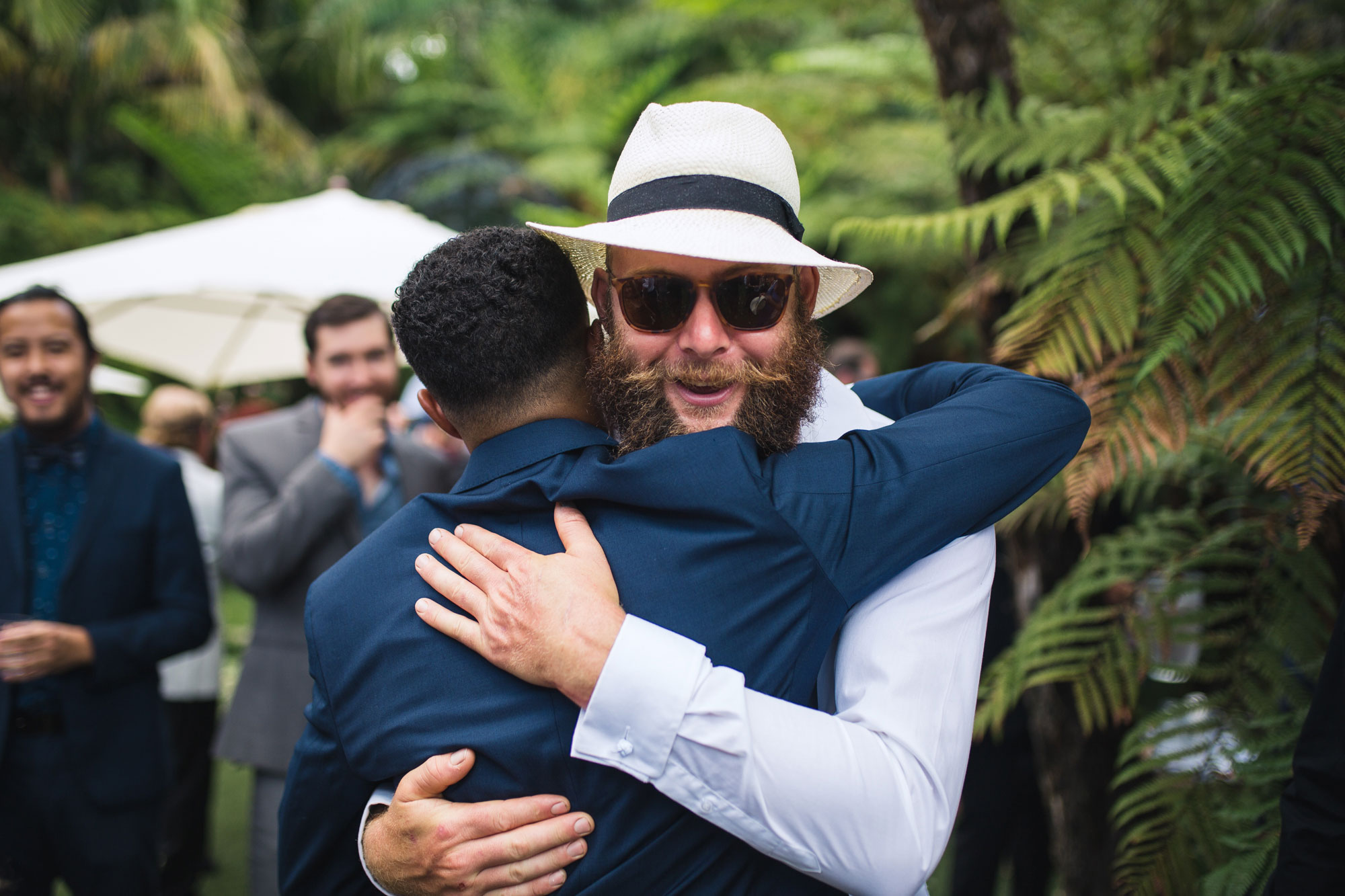 guest embracing the groom