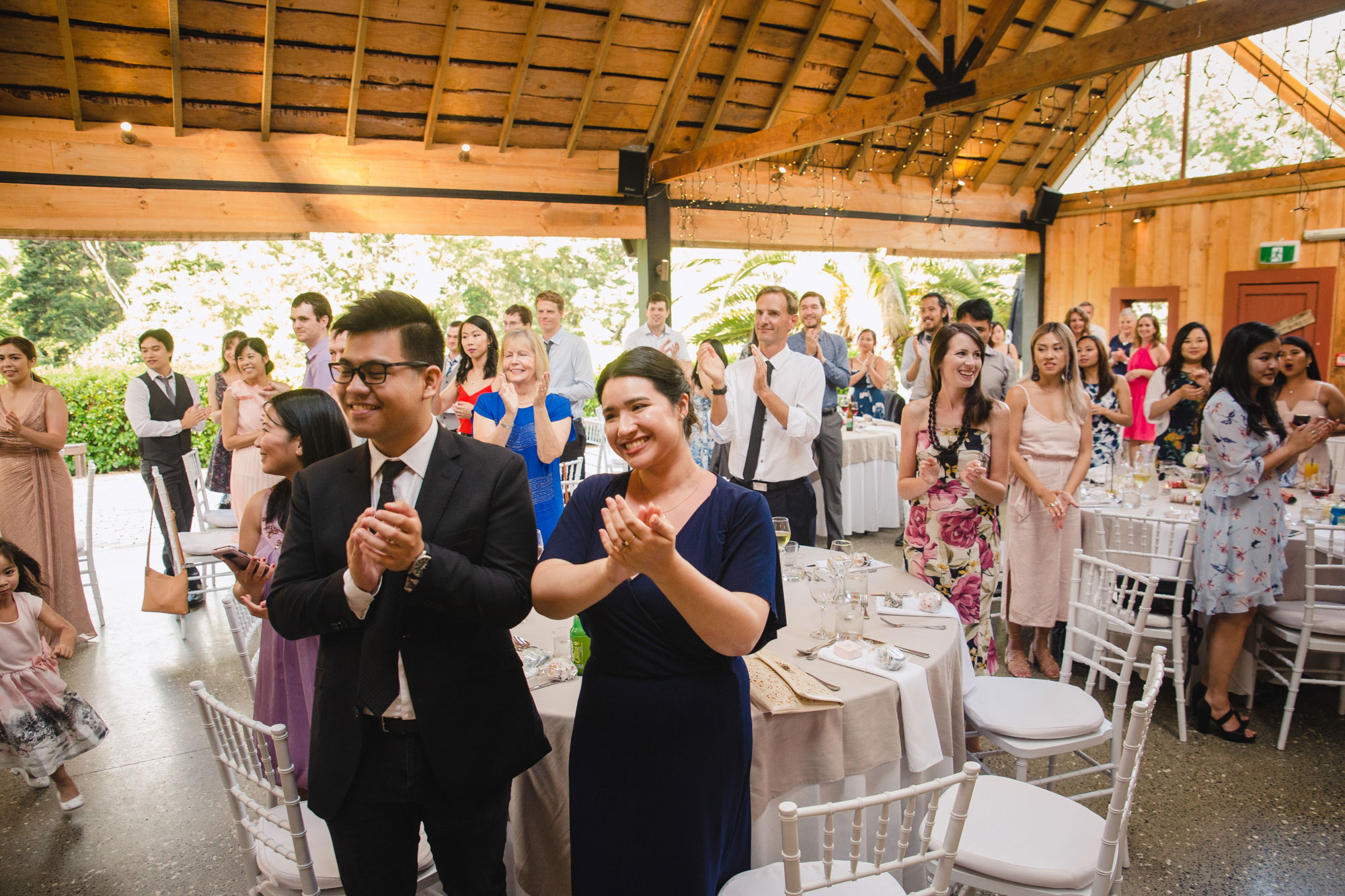 wedding guests clapping