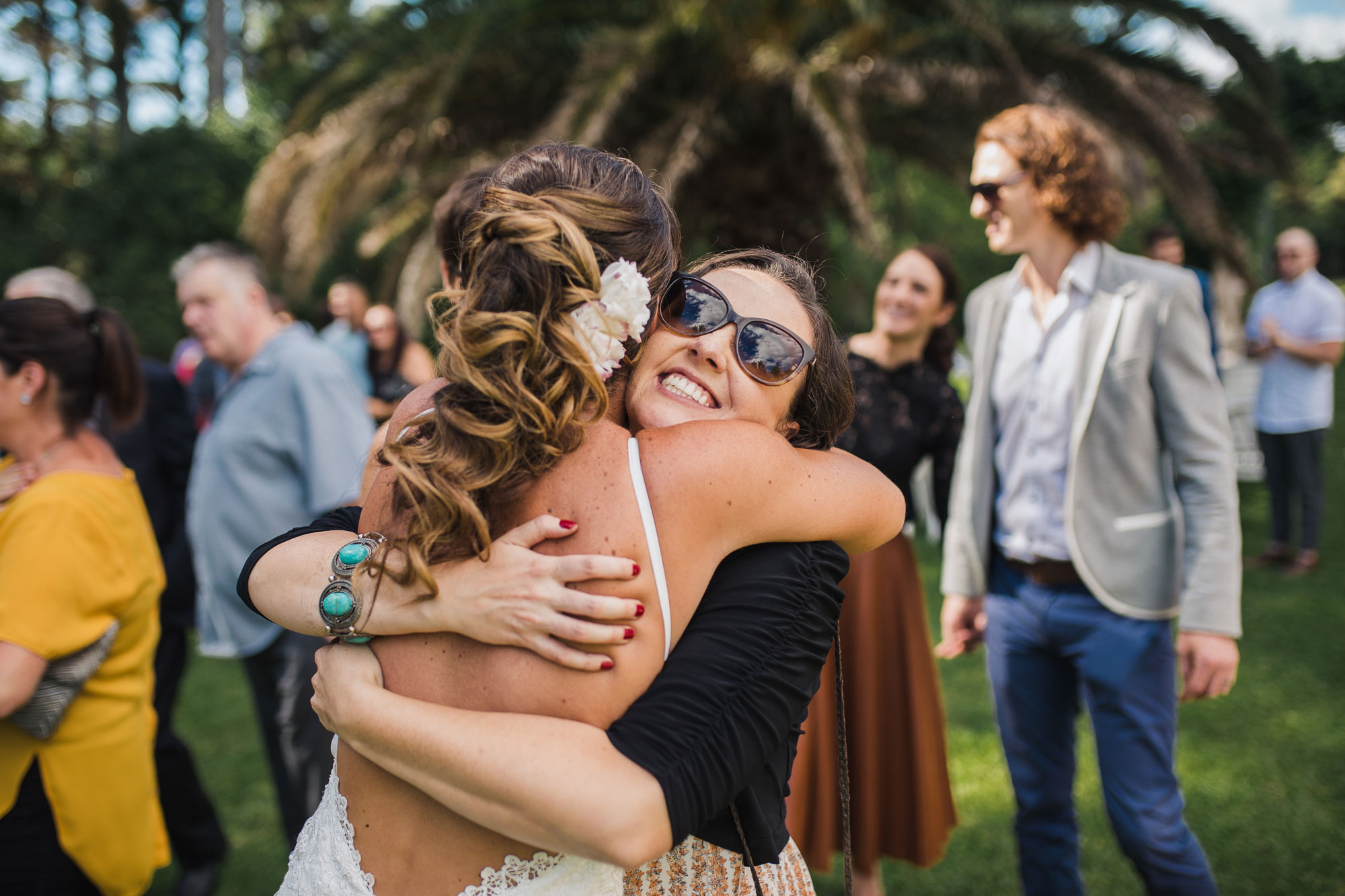 guest embracing the bride