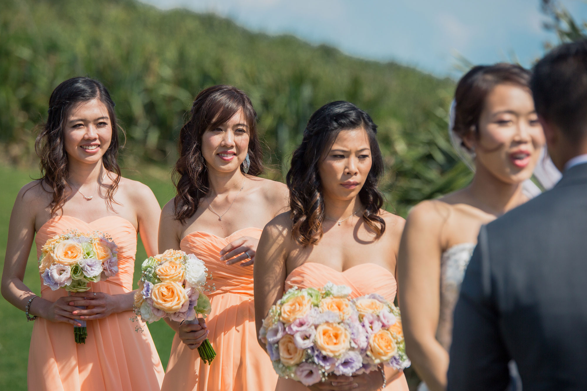 bridesmaids looking on