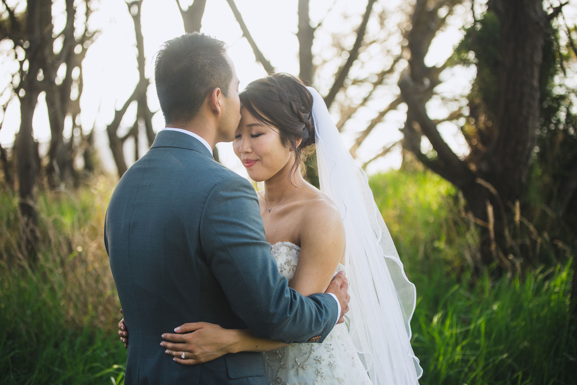 groom kissing the bride