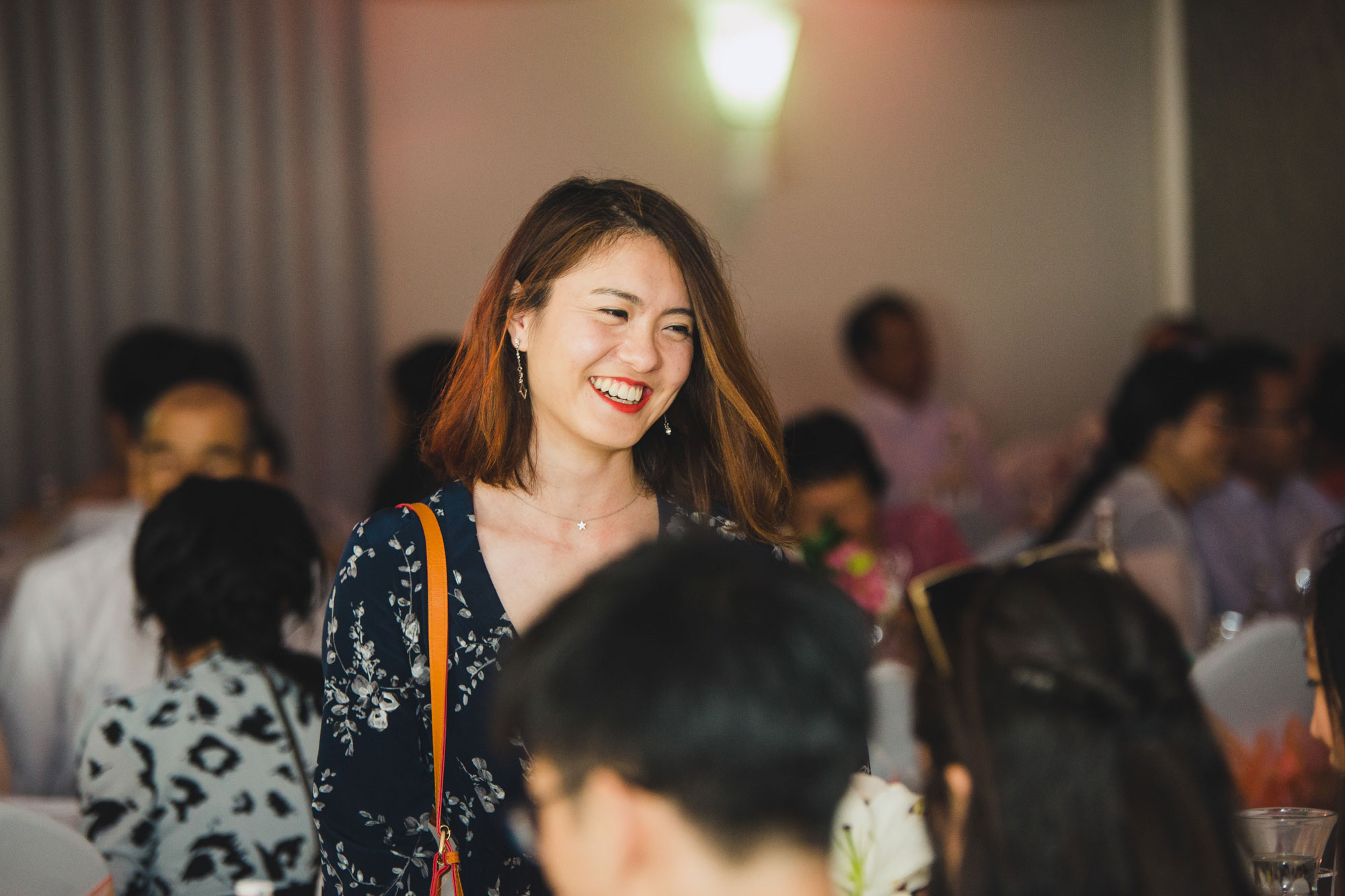 wedding guest smiling