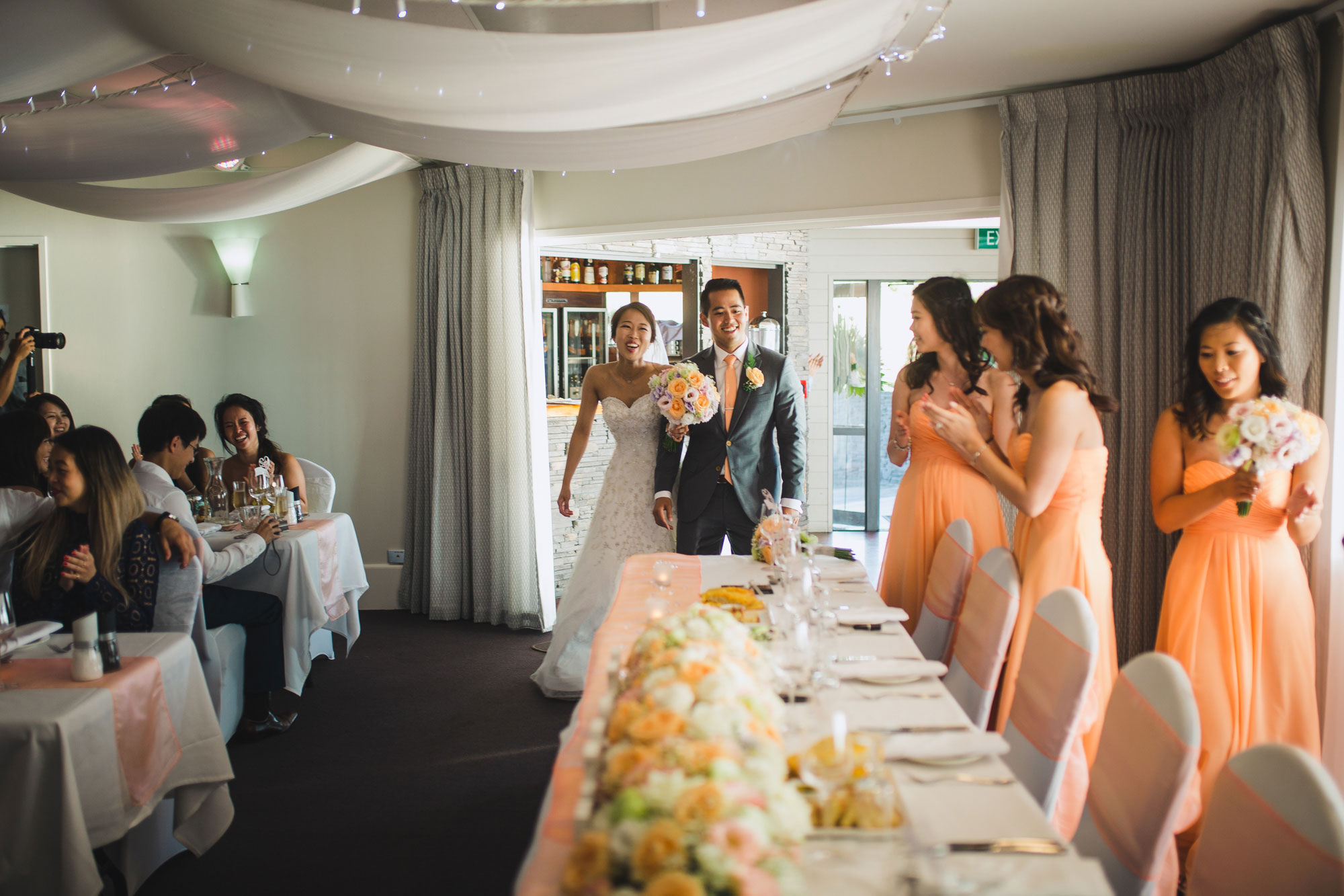 bride and groom enter reception