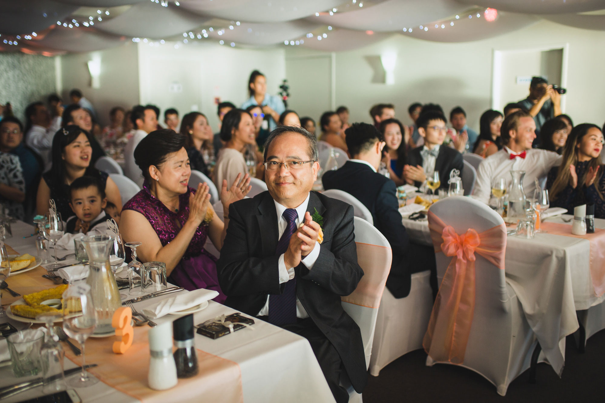 guests welcoming bride and groom