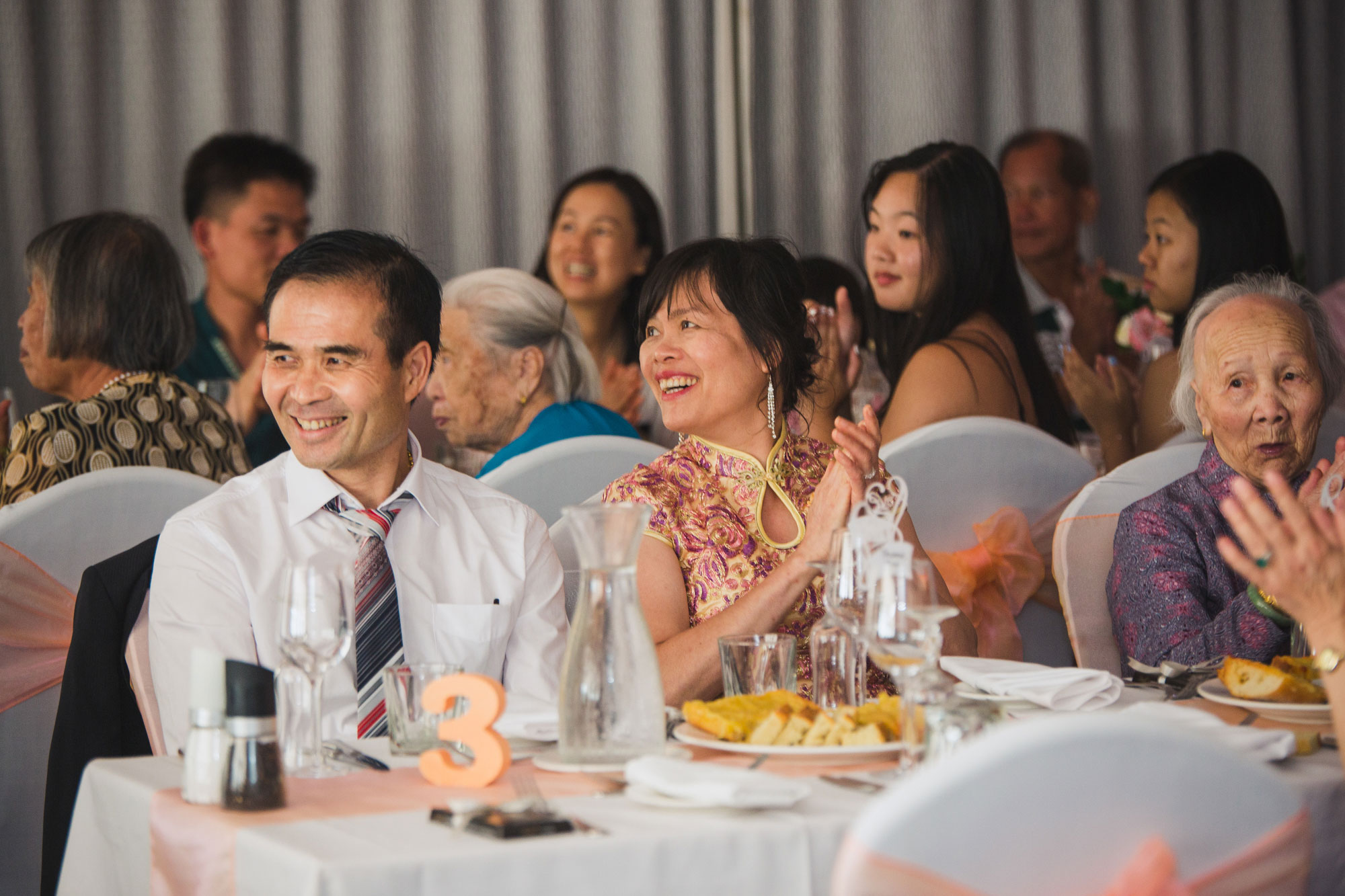 parents of the bride smiling