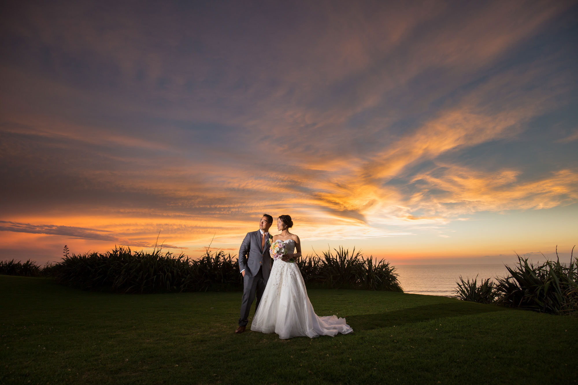 castaways waiuku sunset wedding photo