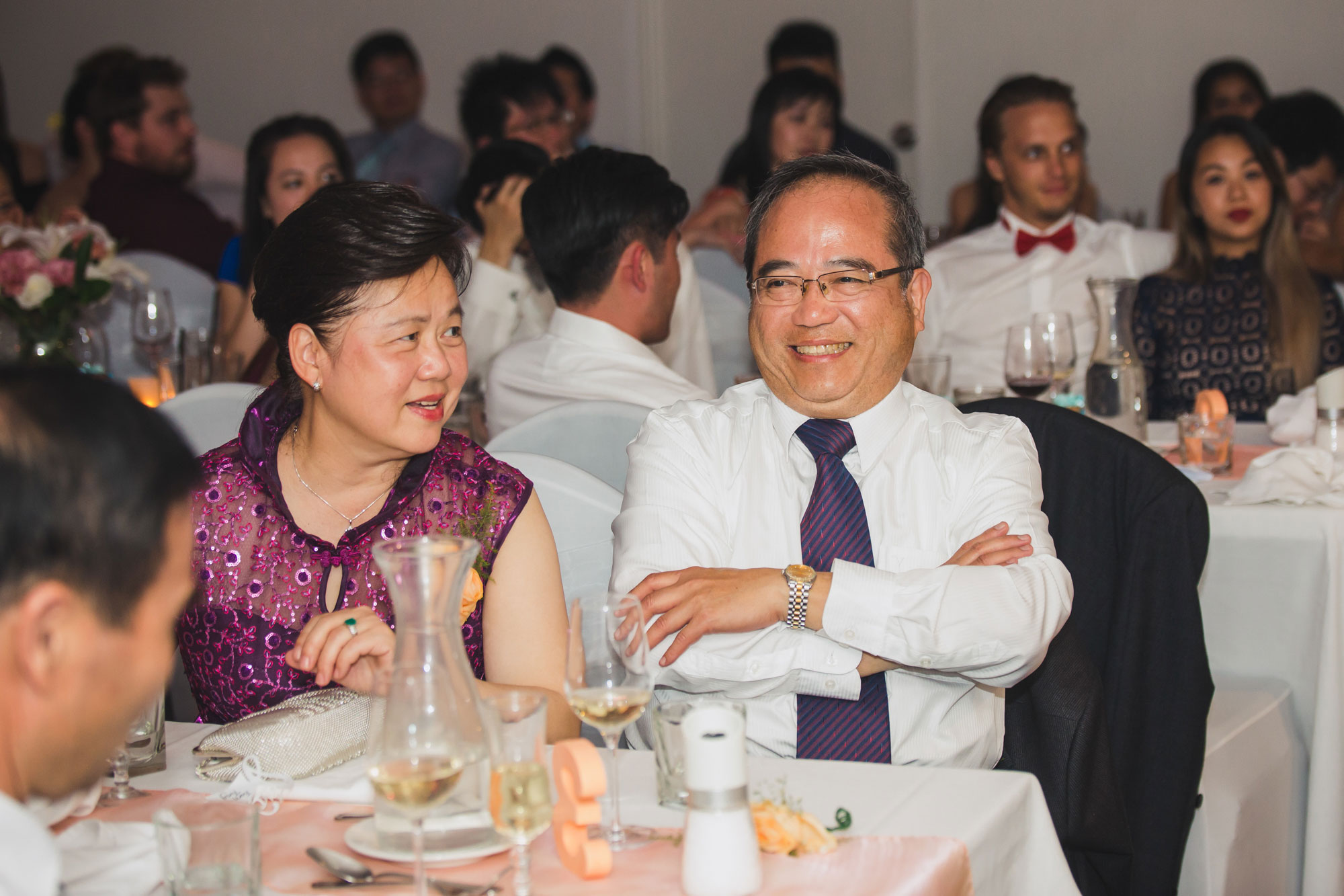 father of the groom laughing