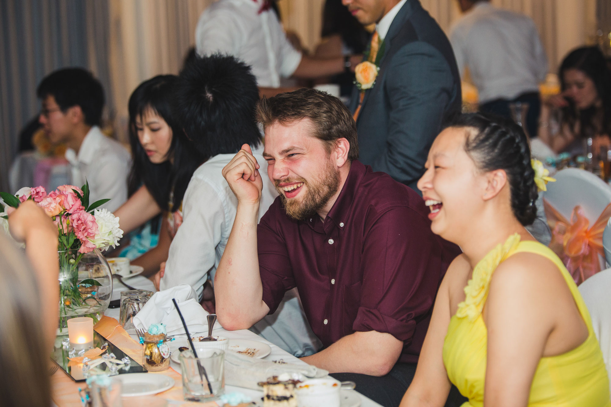 wedding guests laughing