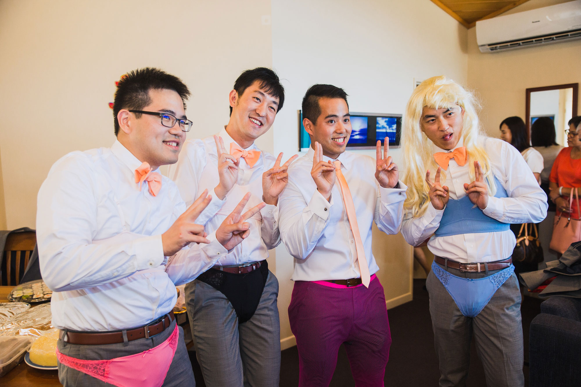 groom and groomsmen posing