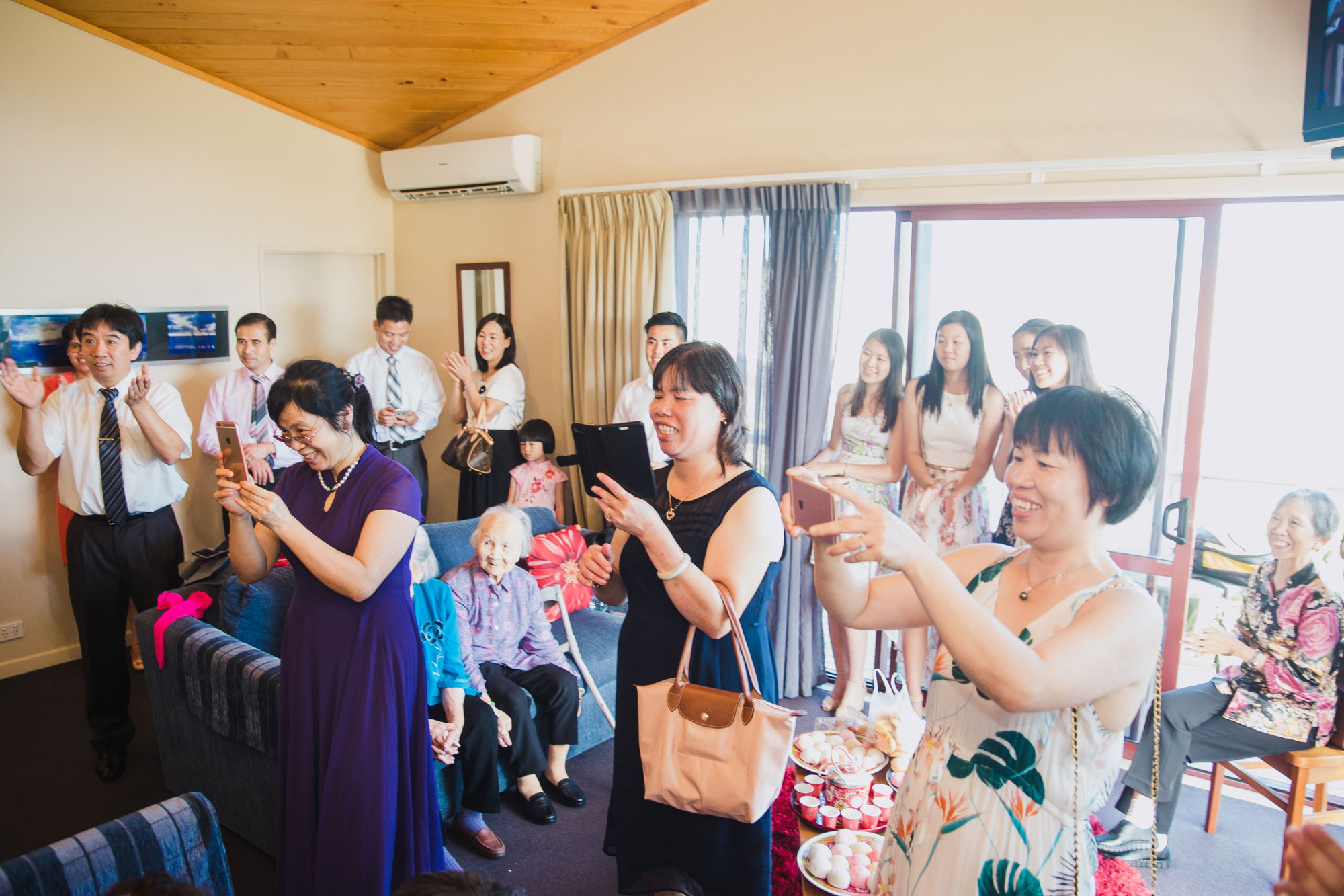 family congratulating the groom