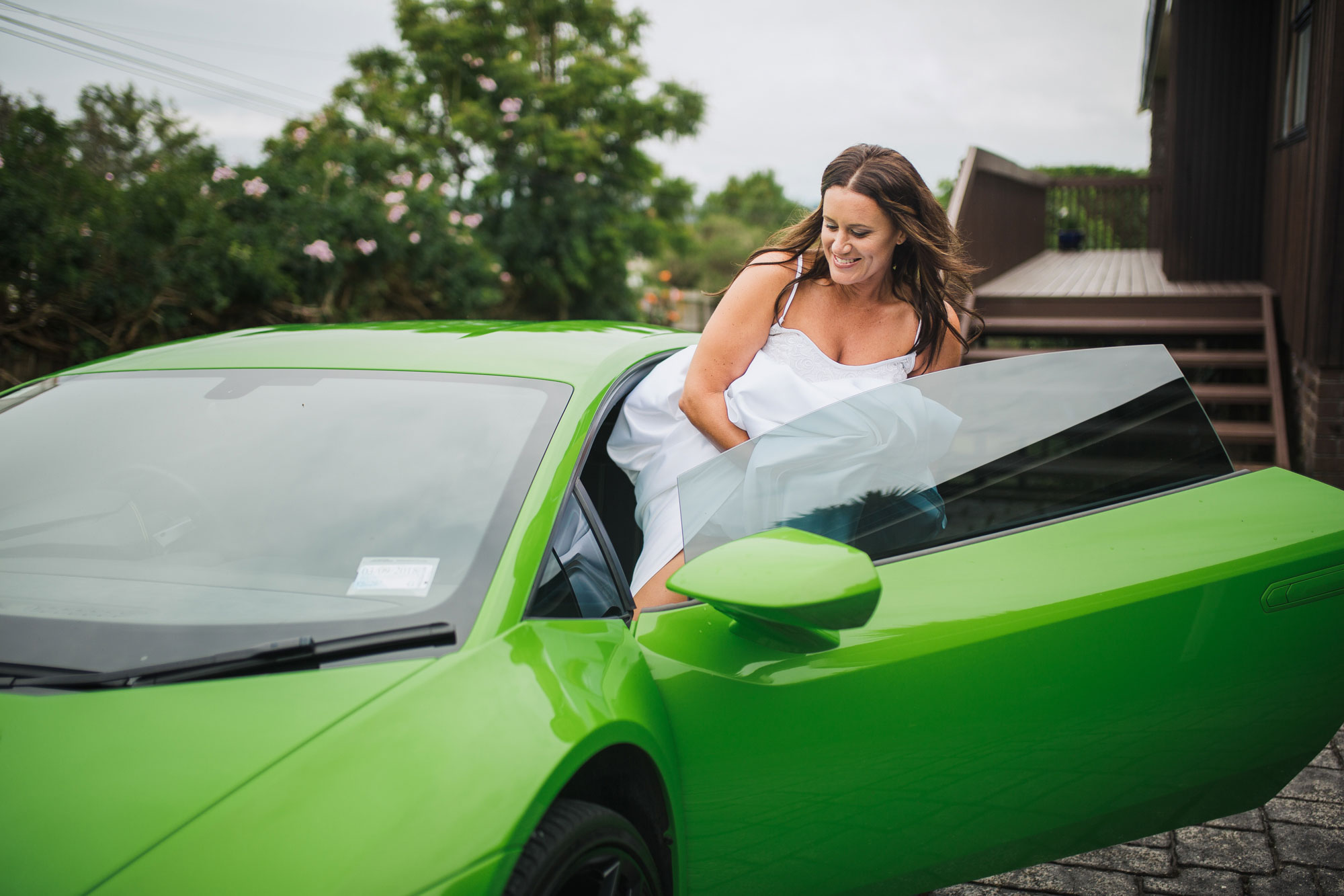 bride getting into car