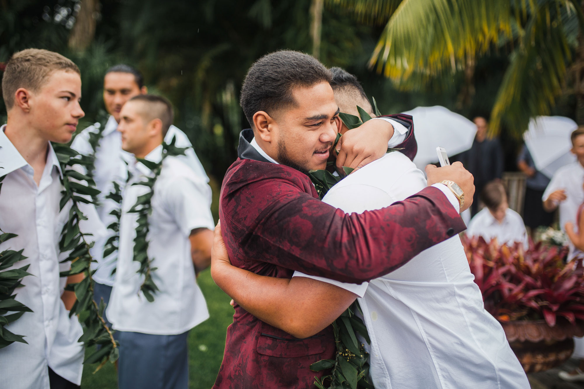 guests congratulate groom