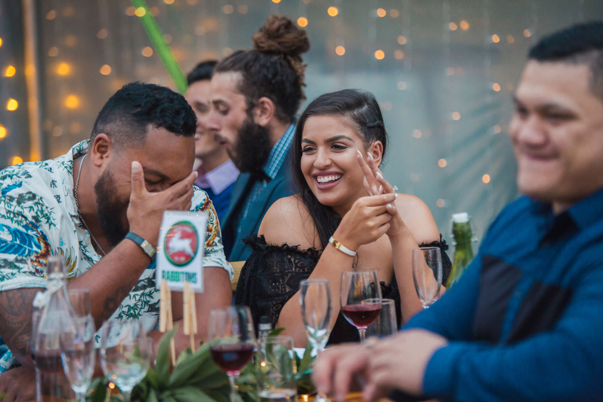 wedding guests laughing