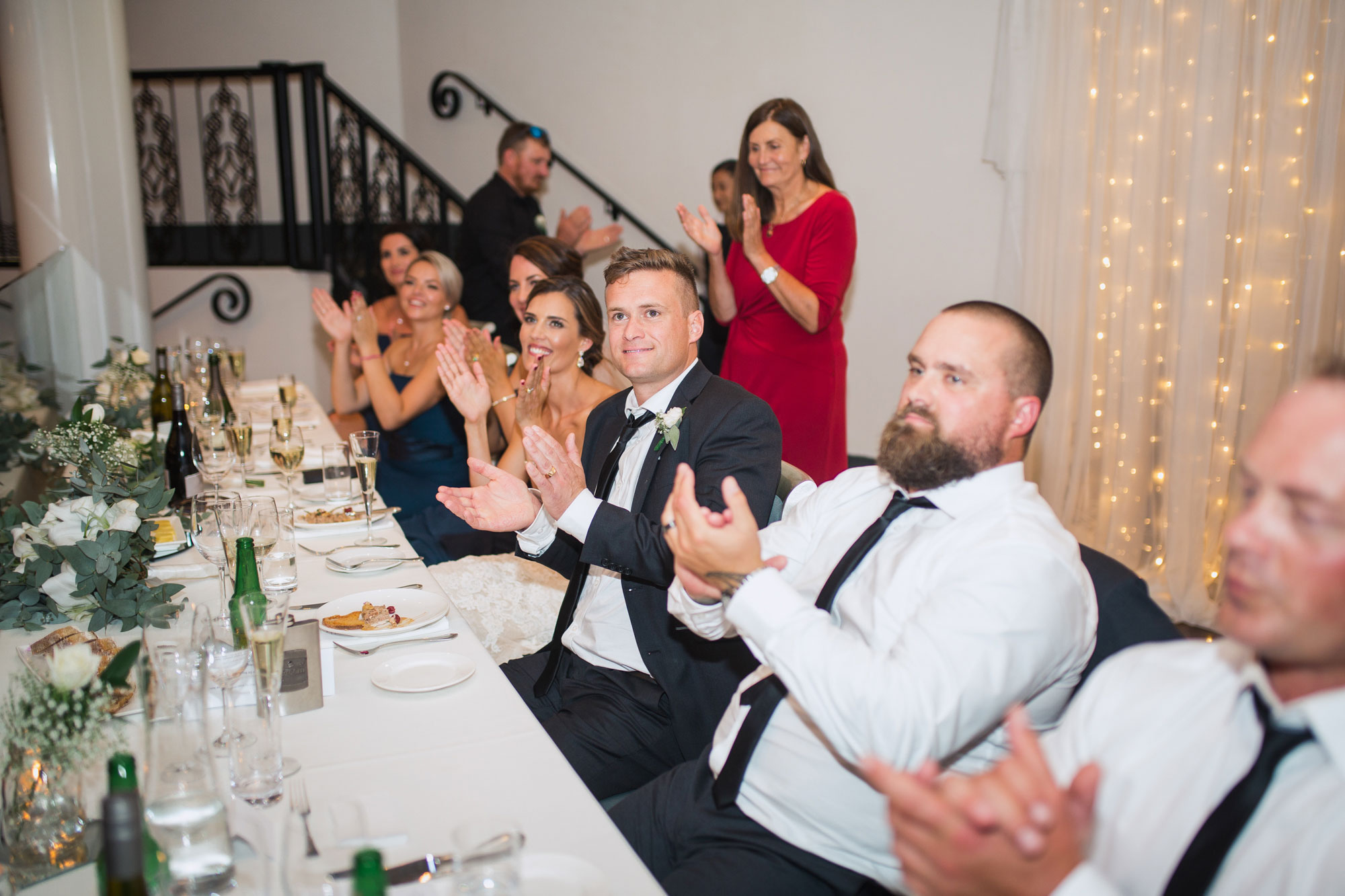 bridal party clapping