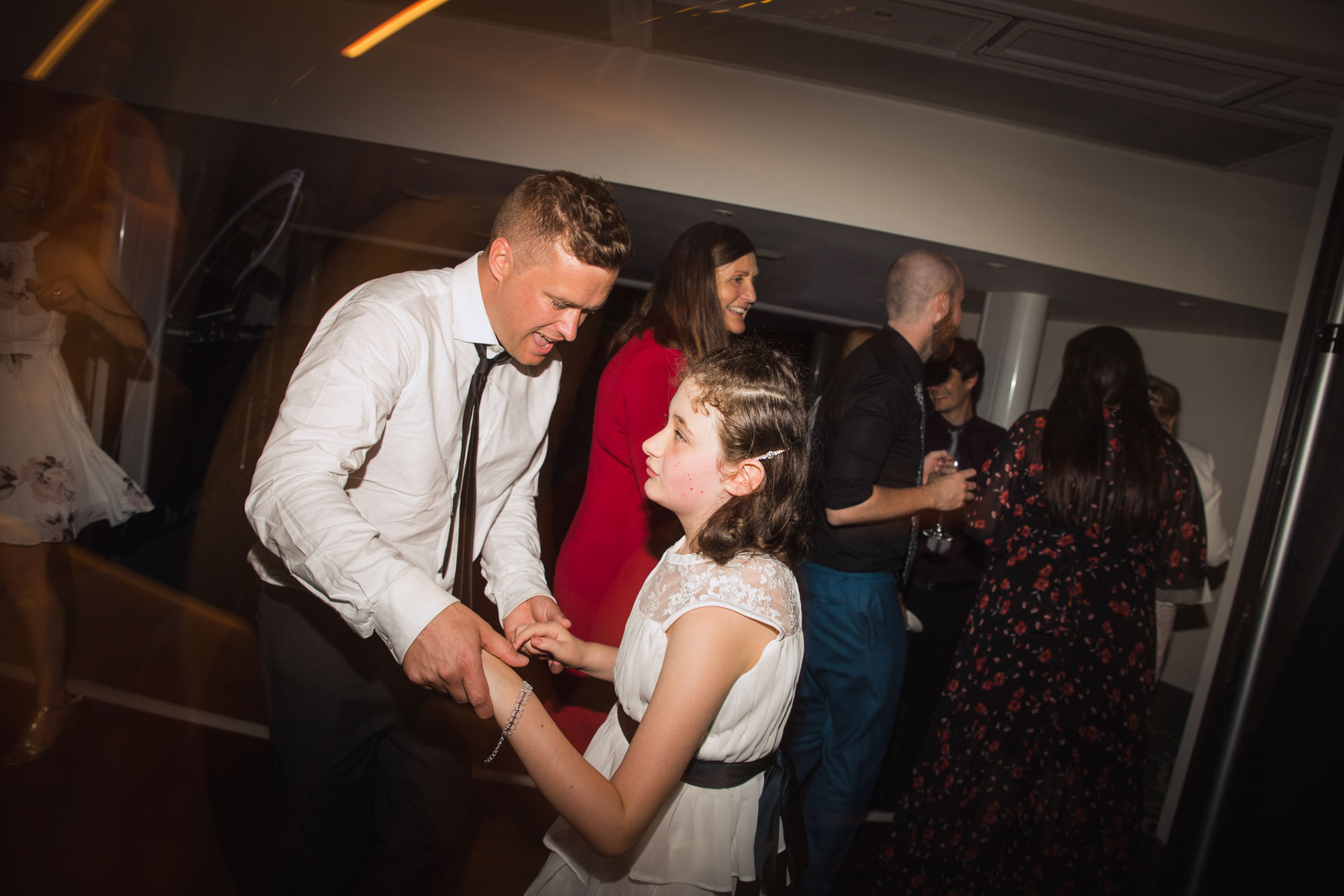groom and daughter dance