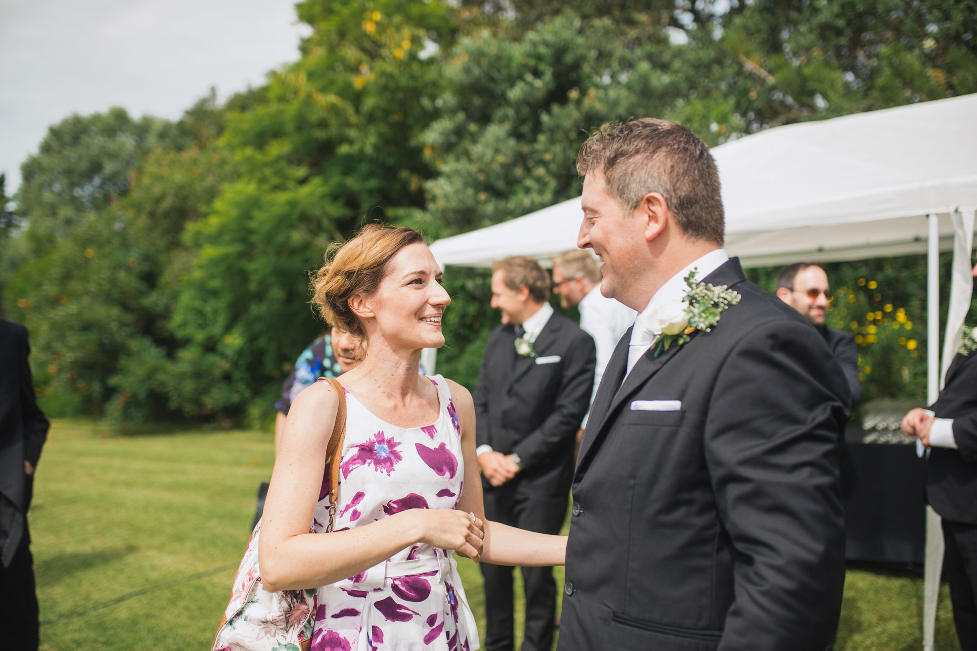 guest congratulate groom