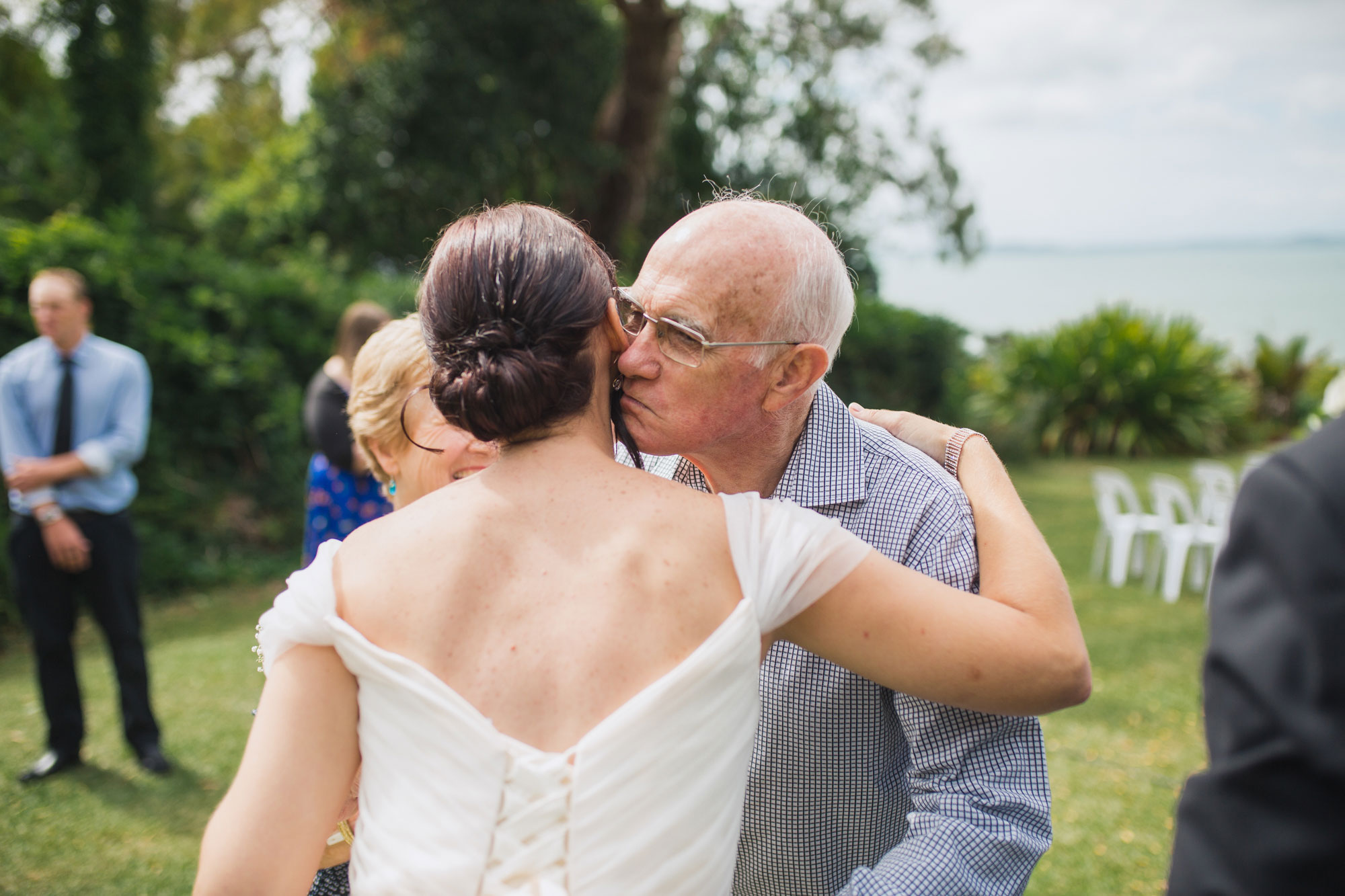 guest kissing bride