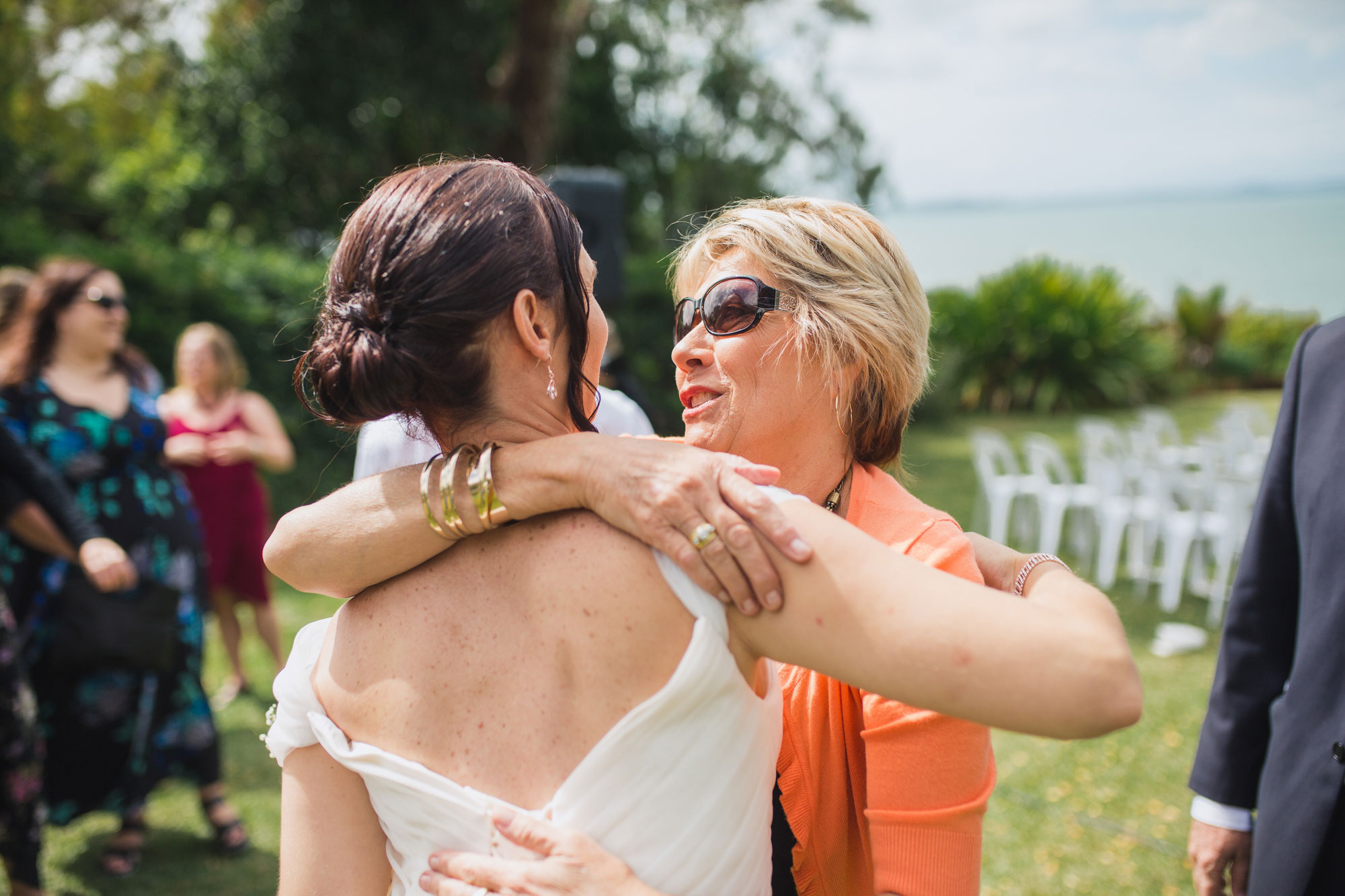 guest embracing bride