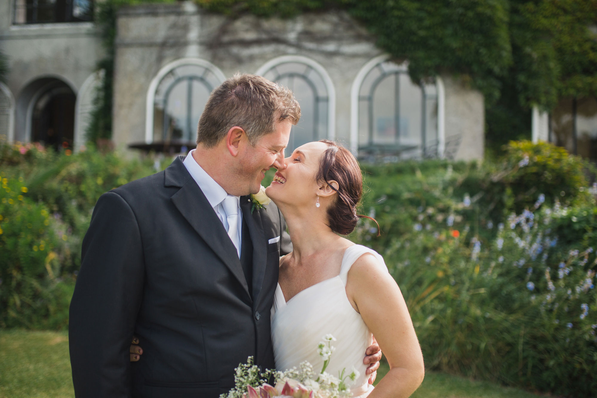 bride and groom kiss