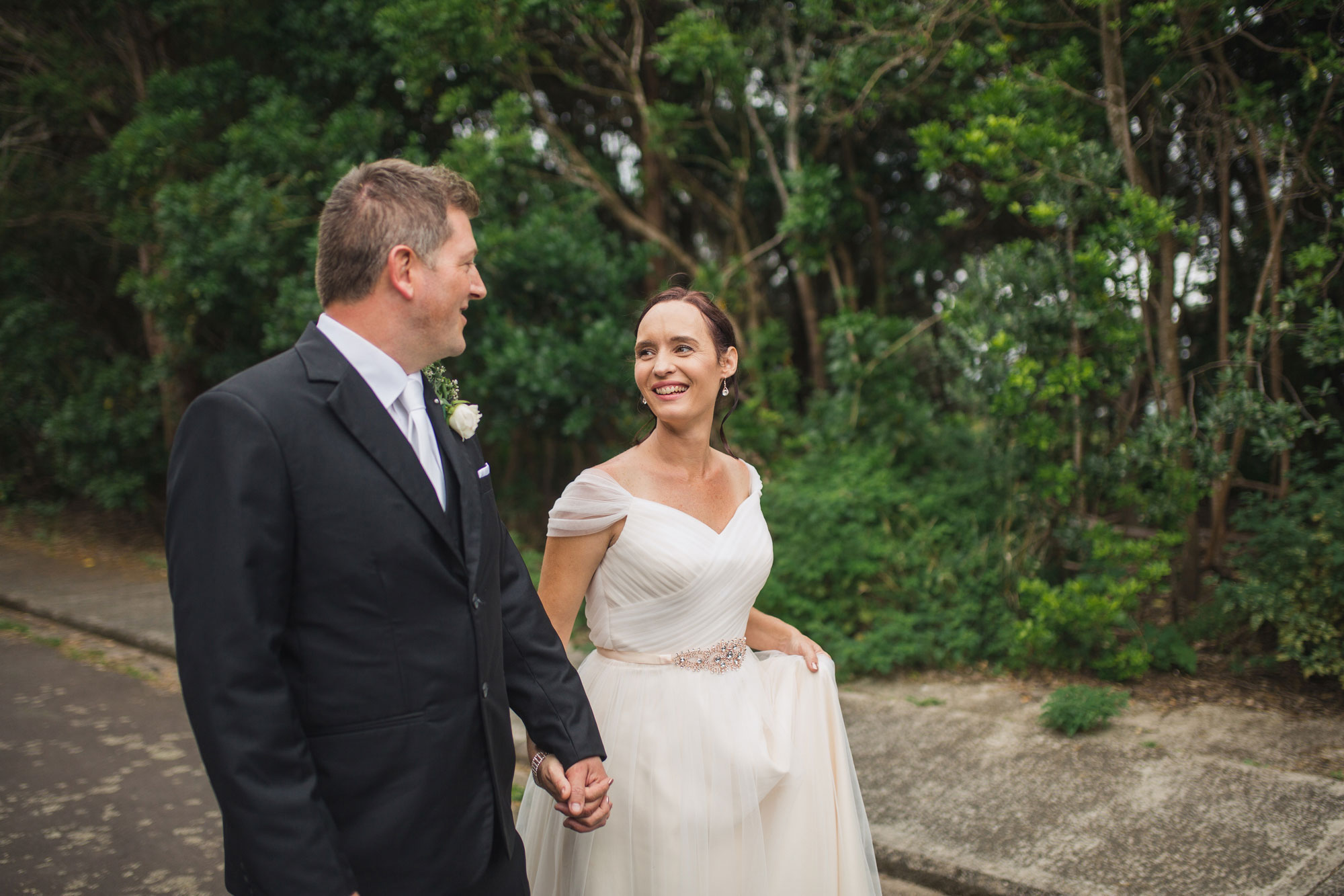 bride smiling at groom