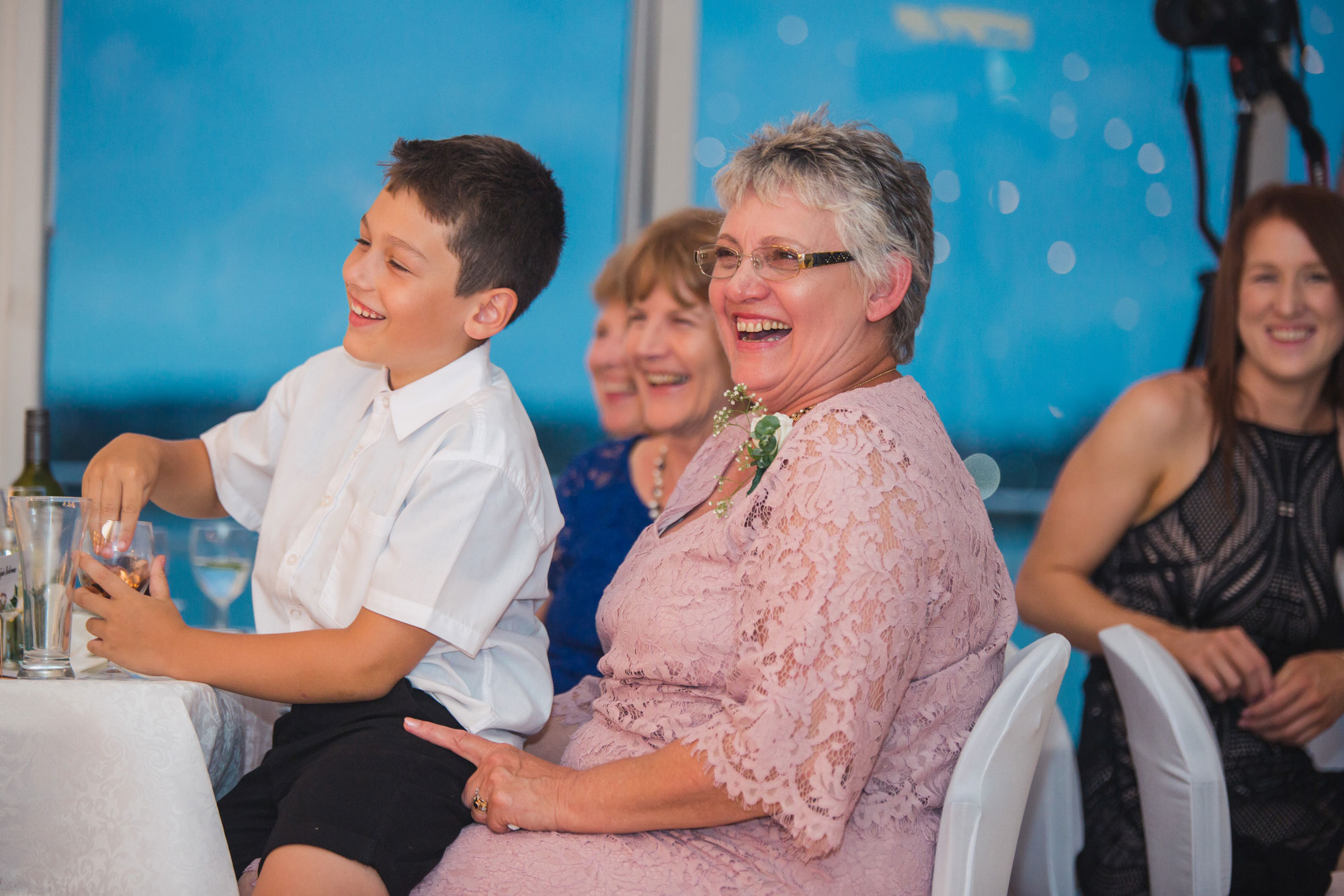 mother of the bride laughing