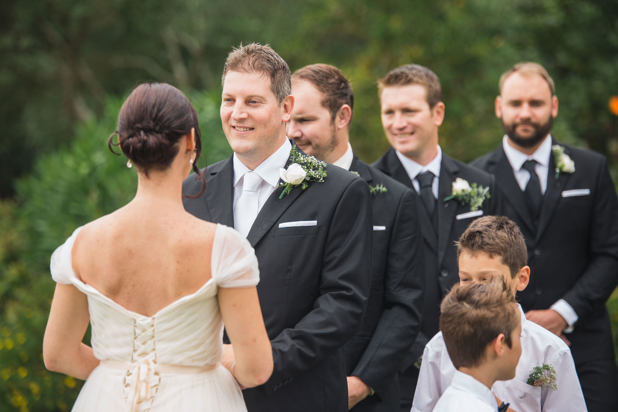 groom holding bride hands