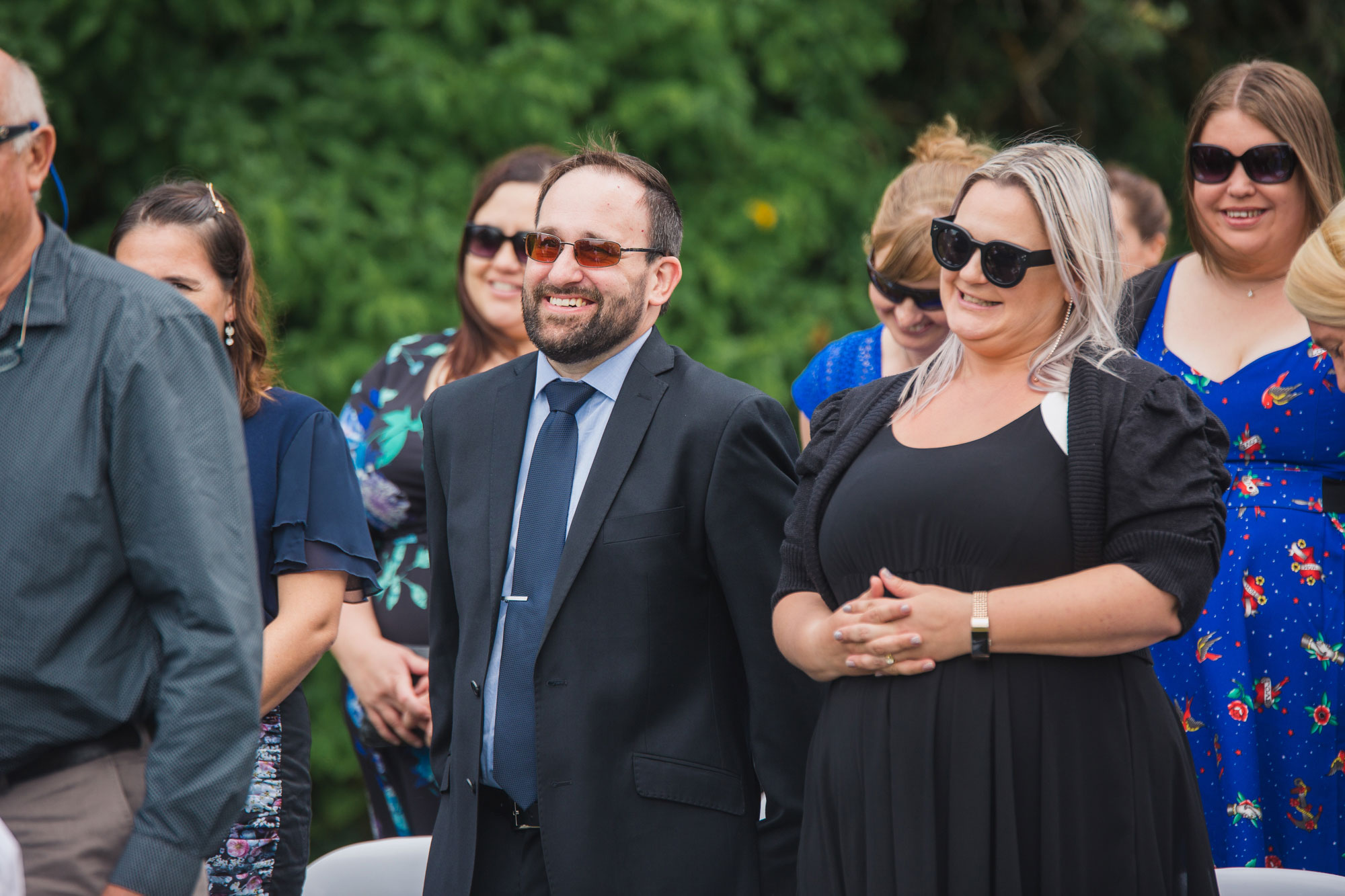 wedding guests standing