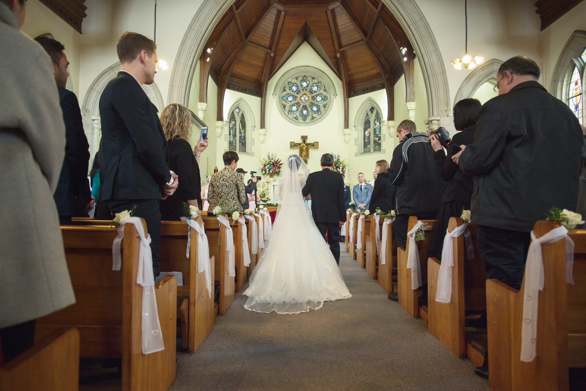 bride and father walking down the aisle