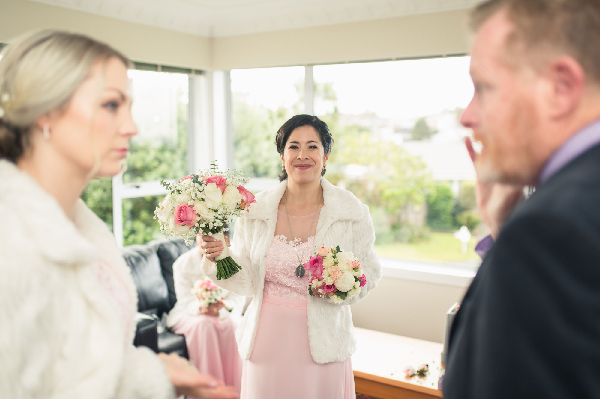 bridesmaid smiling at camera