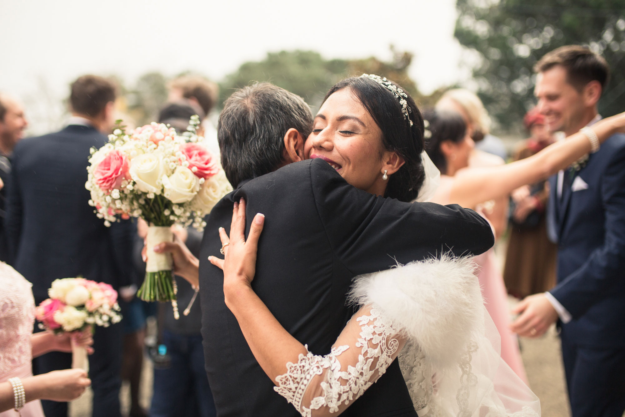 bride hugging a guest